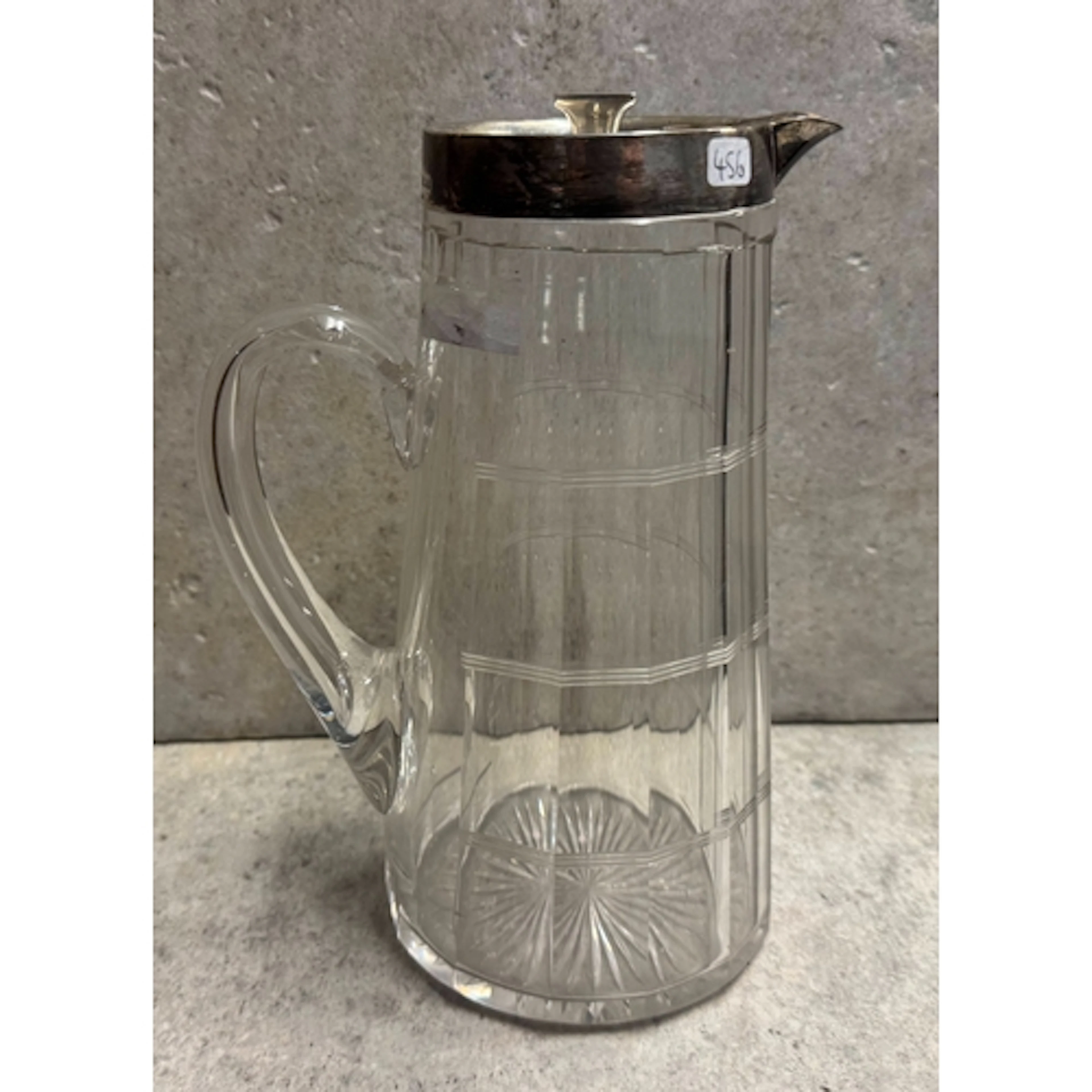 An early 20th Century silver-mounted glass lemonade jug. Bir...