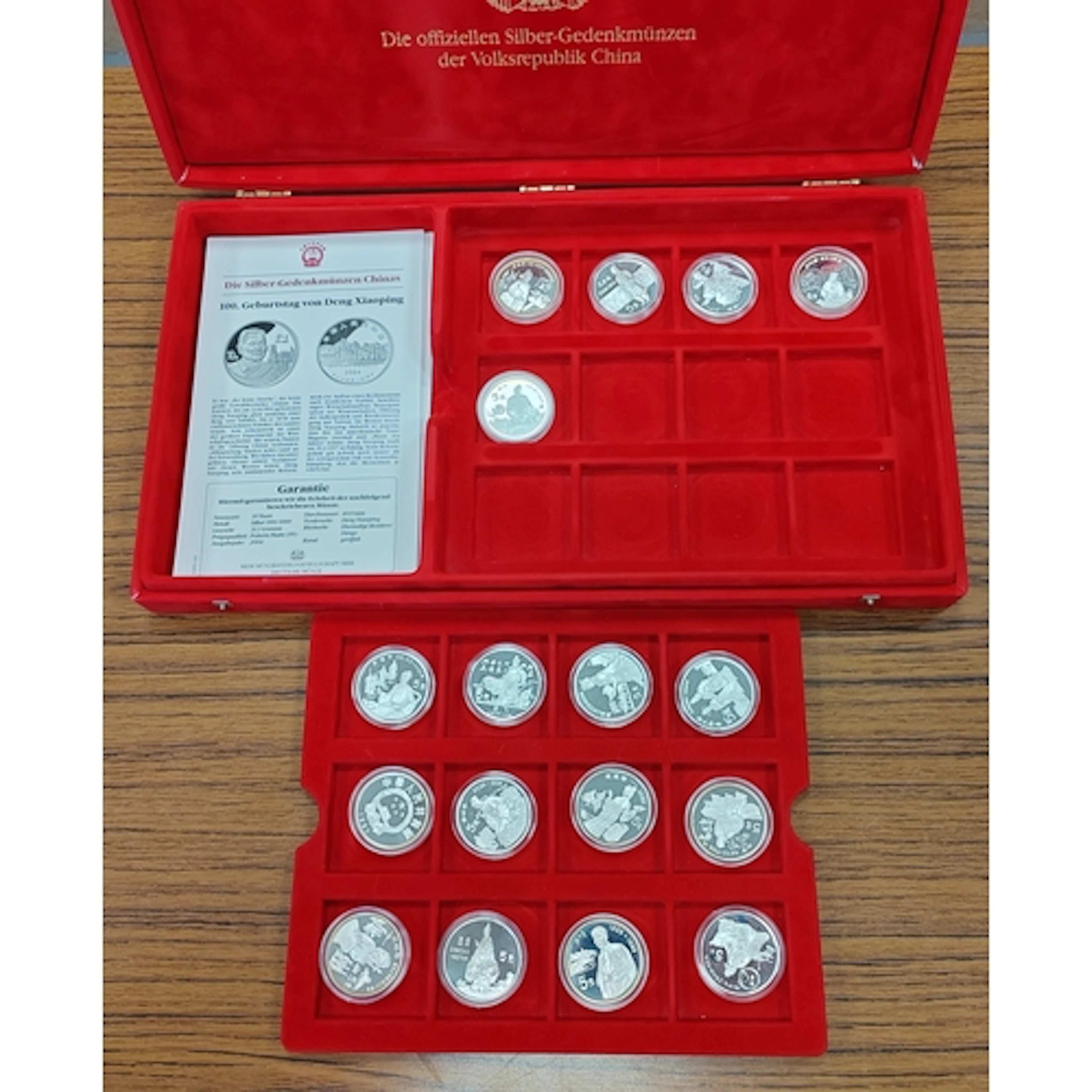 China. Collection of silver proofs FDC, presented in red pre...