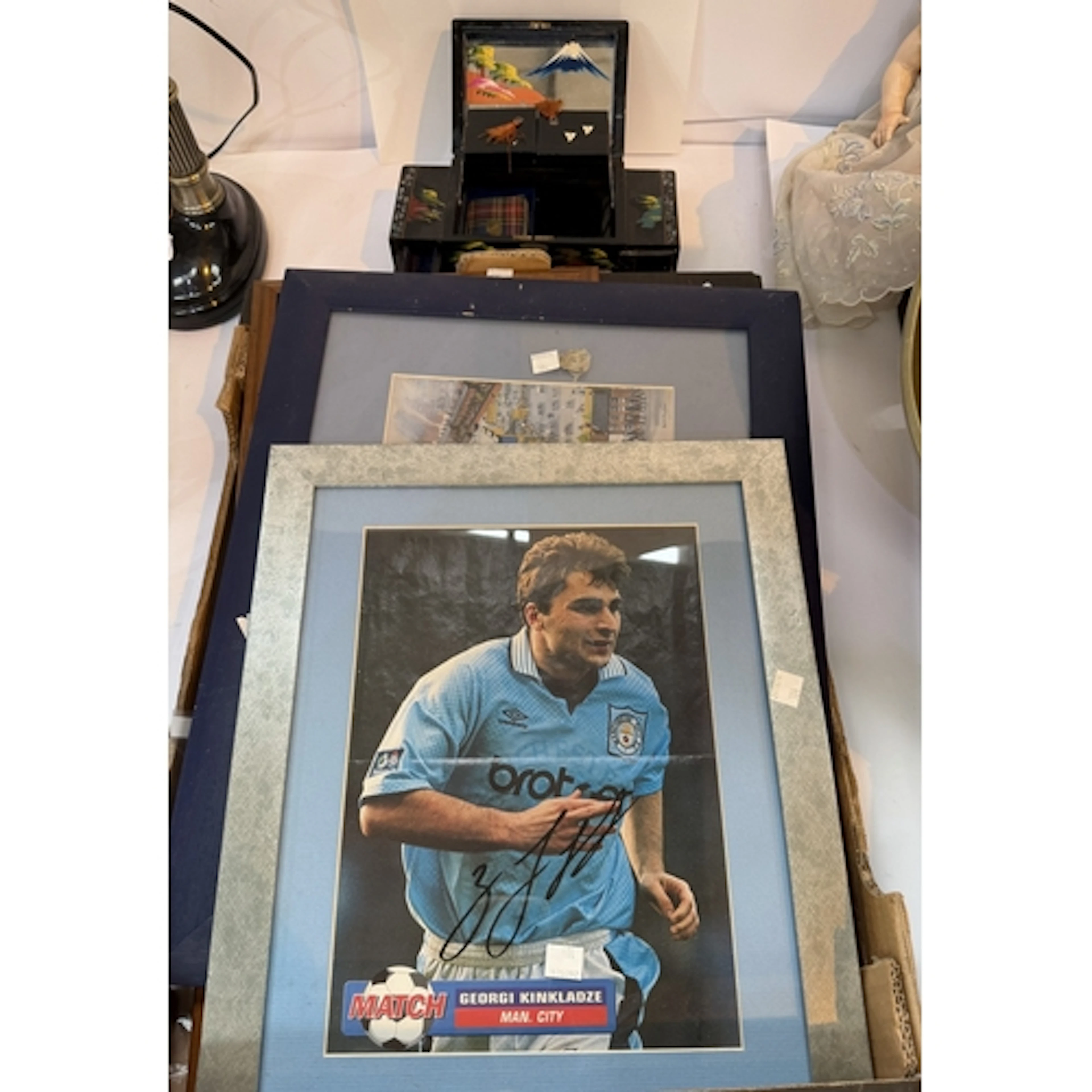 A selection of Man City and other sporting memorabilia, incl...