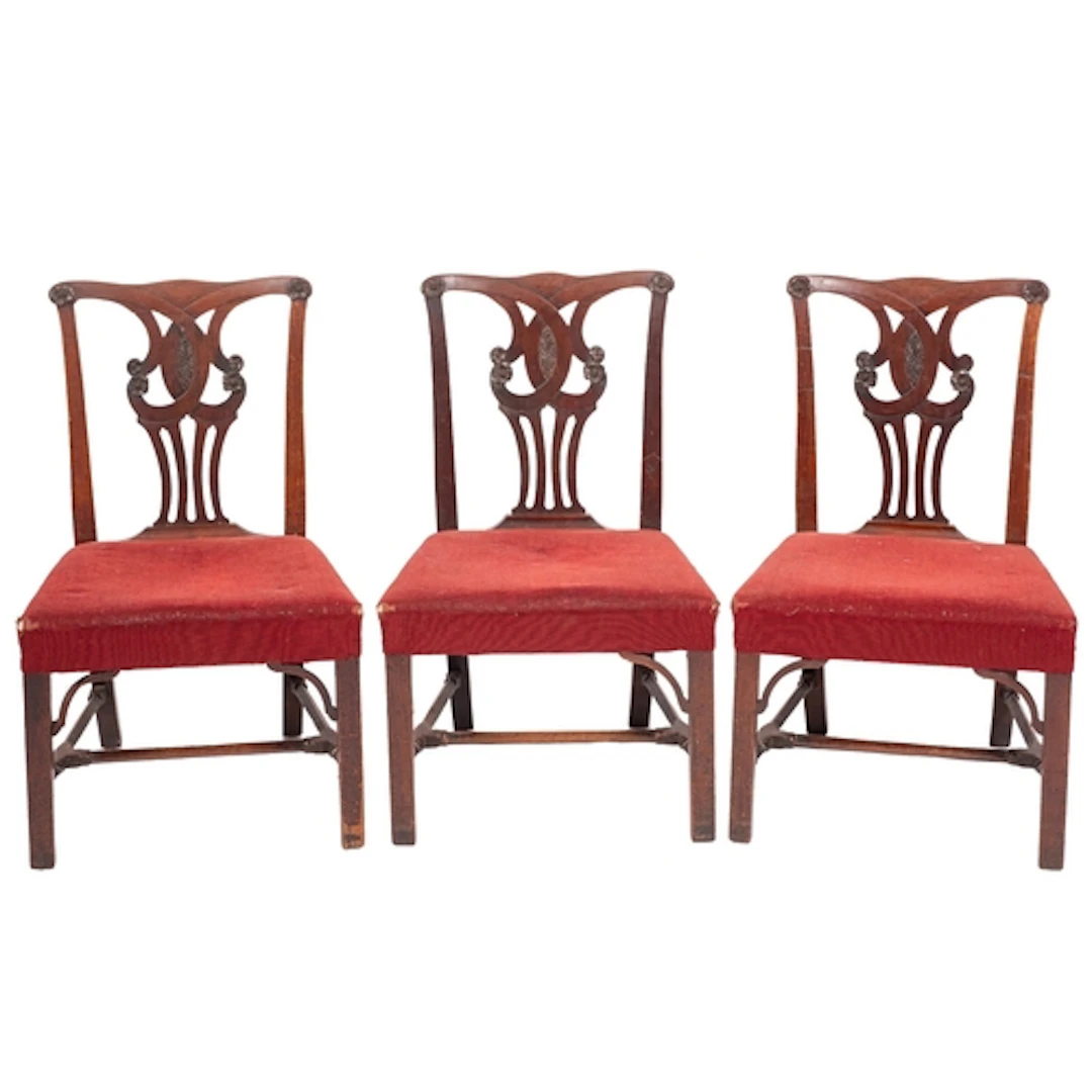 A set of three George III mahogany dining chairs, last quart...
