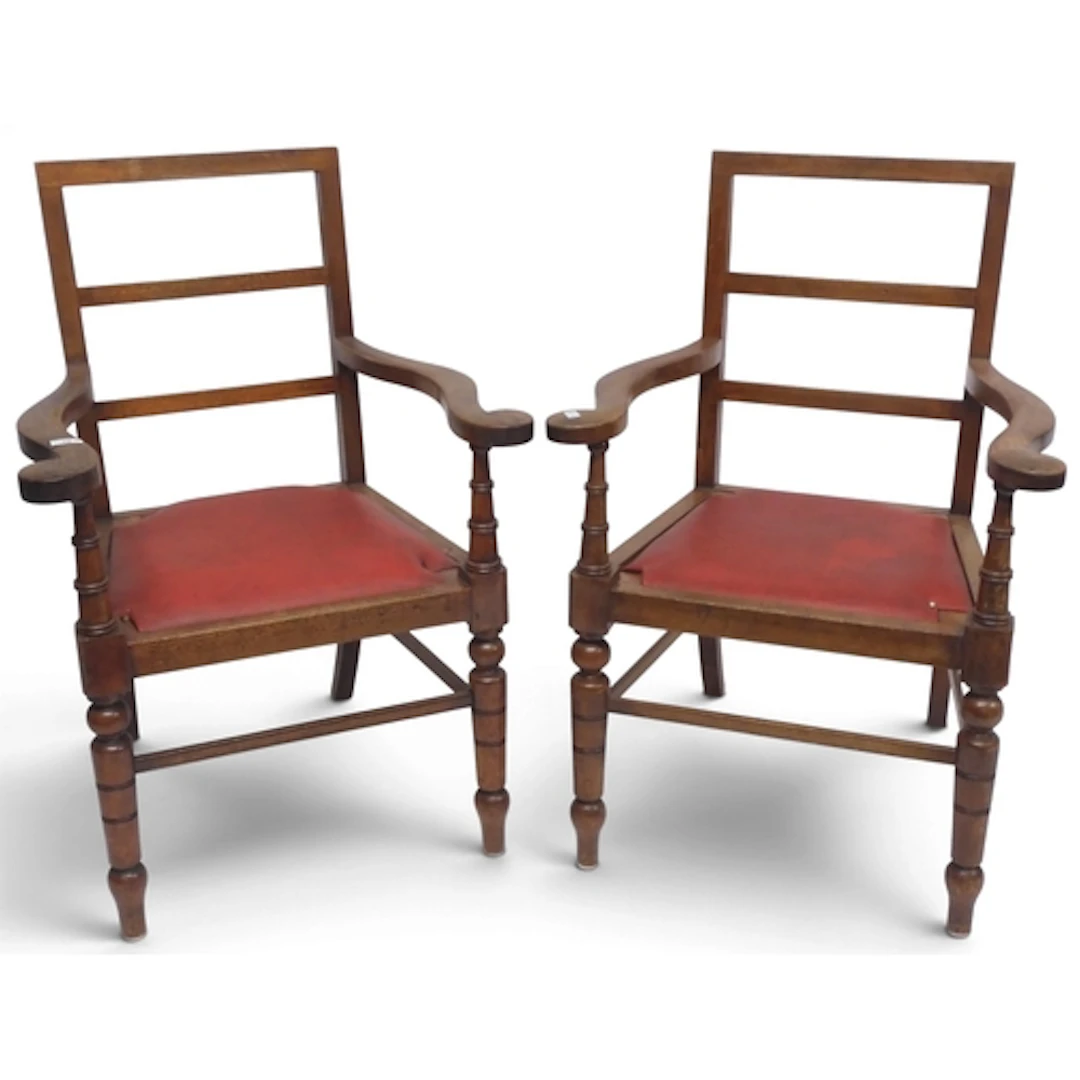 A pair of early 20th century ash framed open armchairs with ...