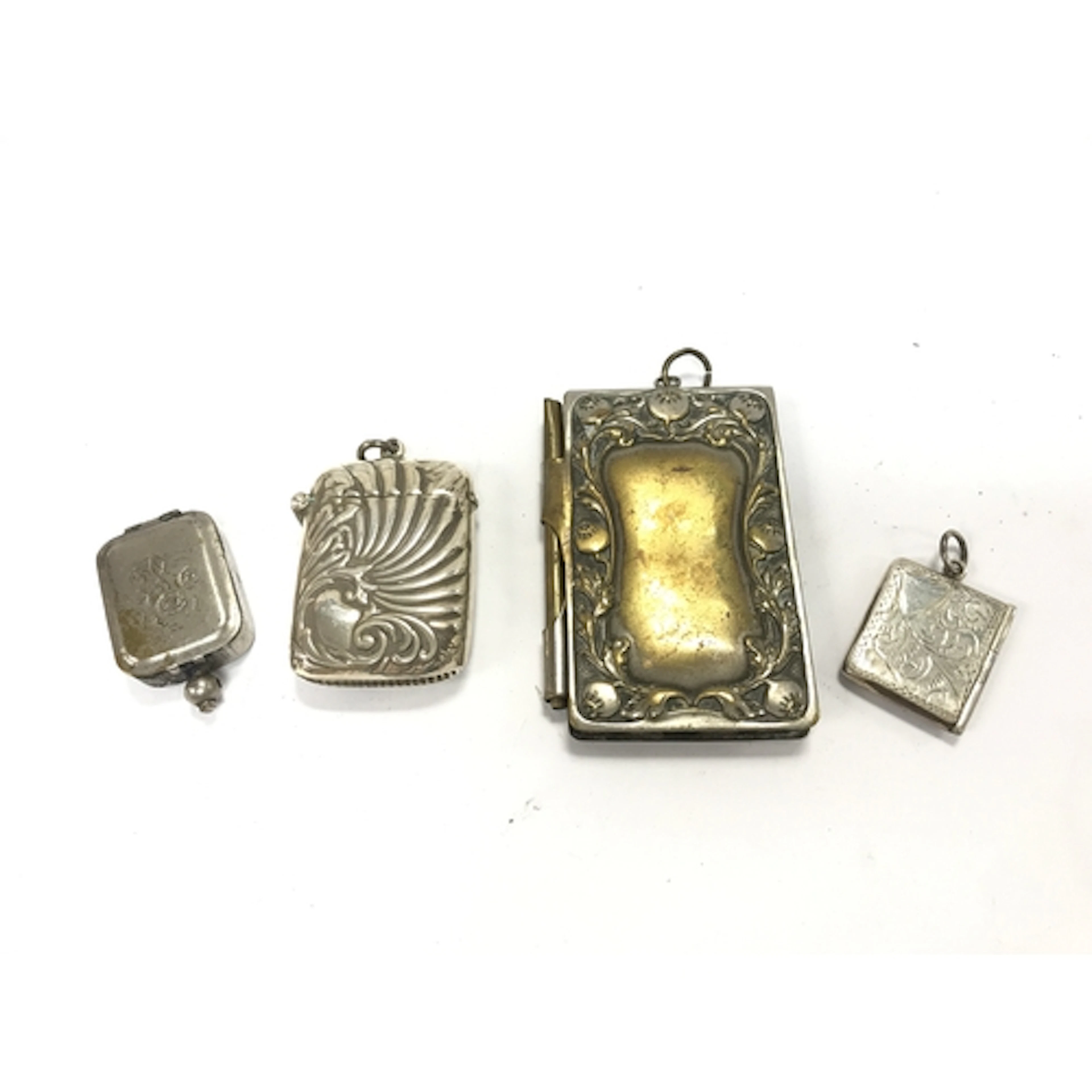 An engraved card case , a silver hallmarked stamp holder , s...