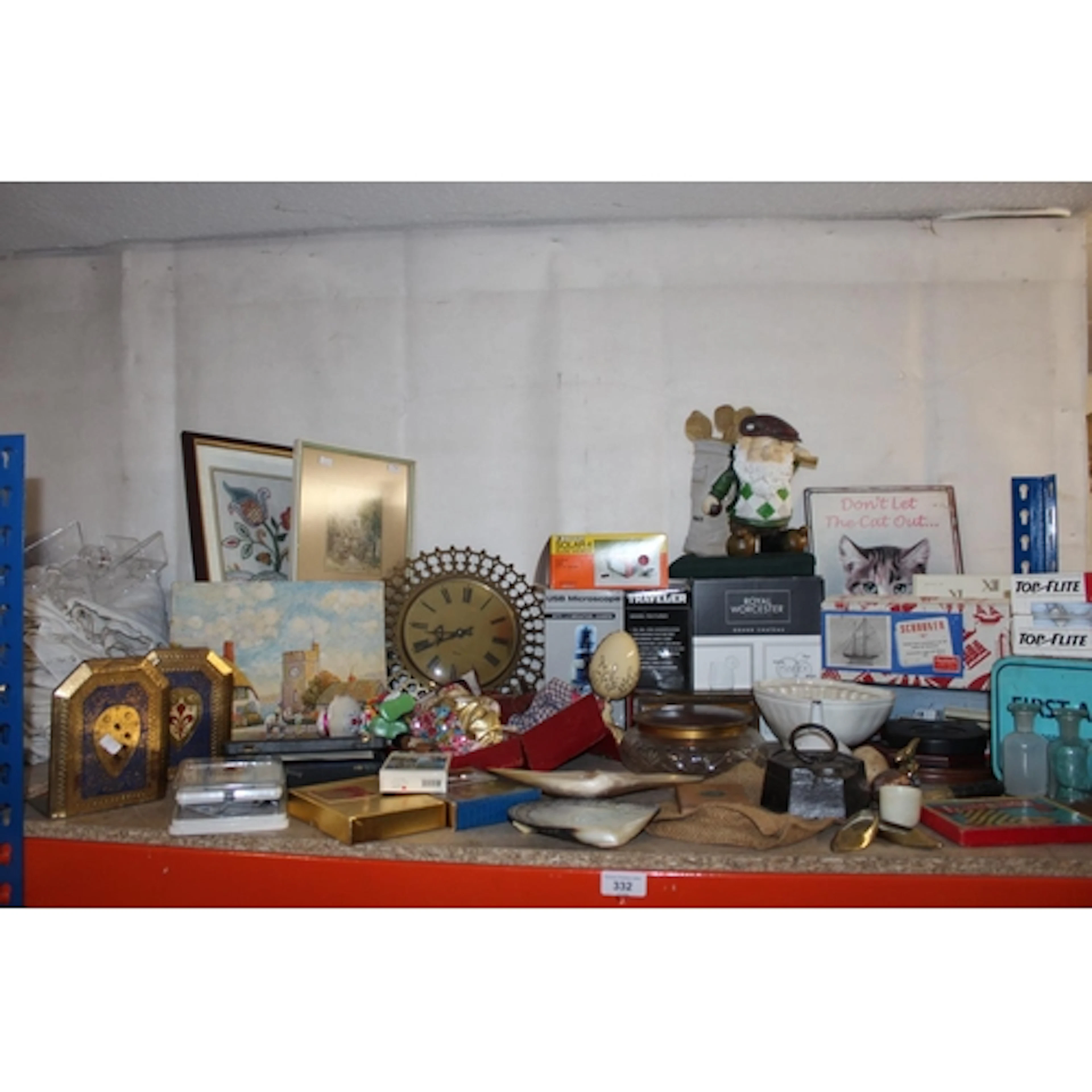 Shelf containing a vintage jelly mould, a Golden Flake tobac...
