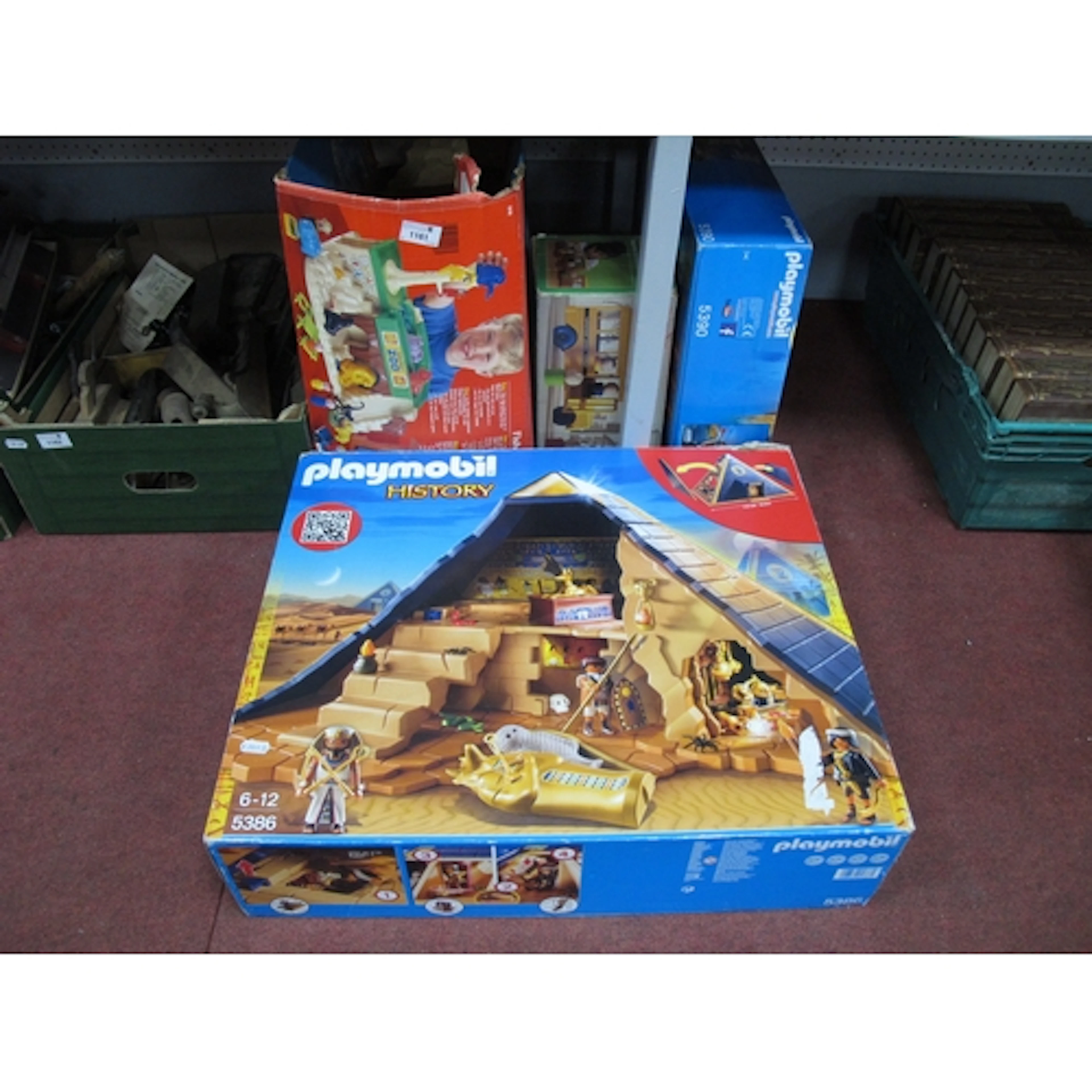 Boxed toys, including Playmobil History Series 5386 and 5390...