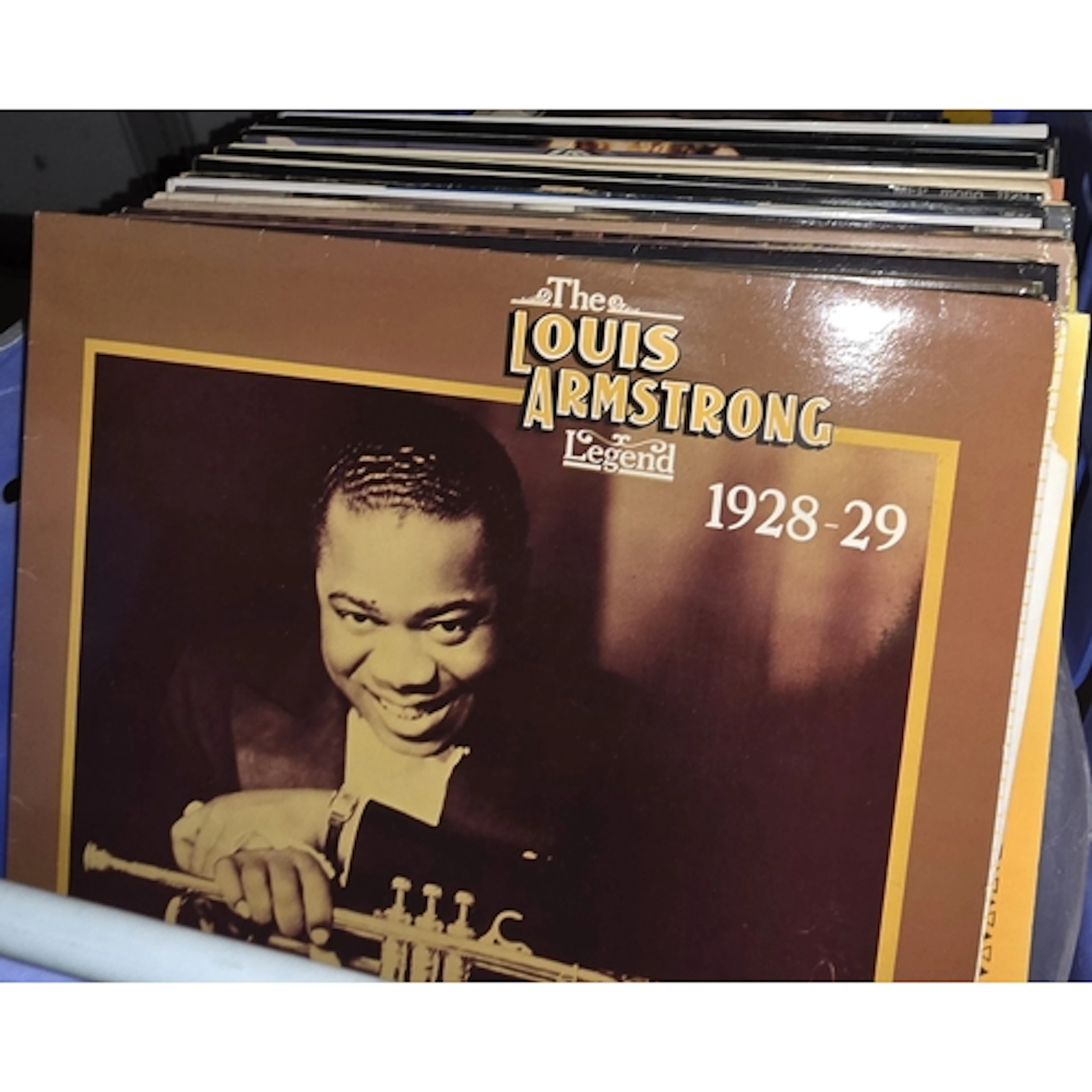 A collection of vintage records, books and toys.