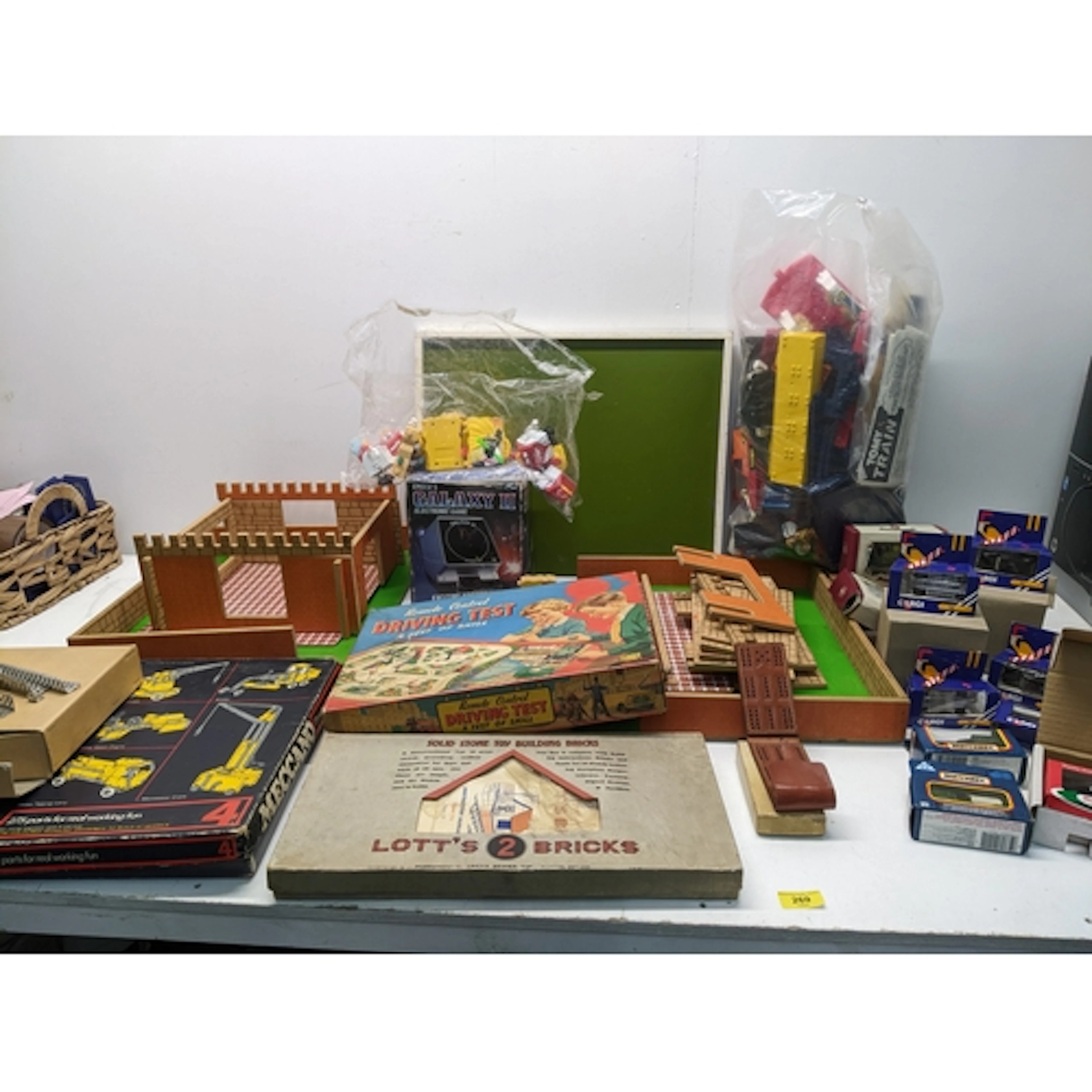 A mixed group of toys, board games, boxed diecast model vehi...