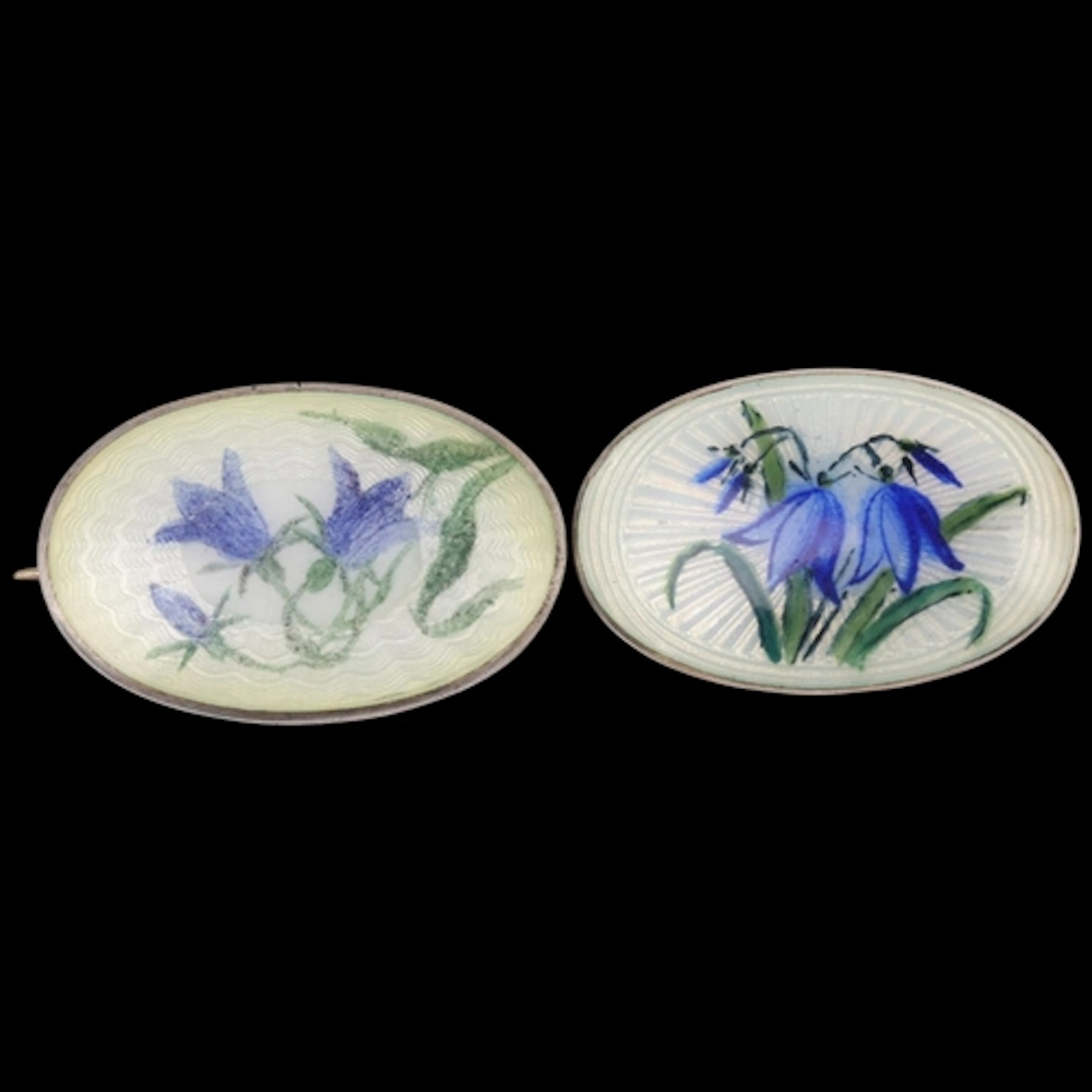 2 Norwegian sterling silver-gilt enamel floral brooches, mak...