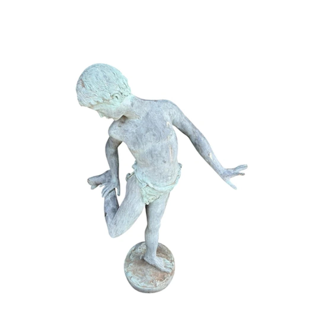 A bronze garden ornament 'The boy bitten by a crab', height ...