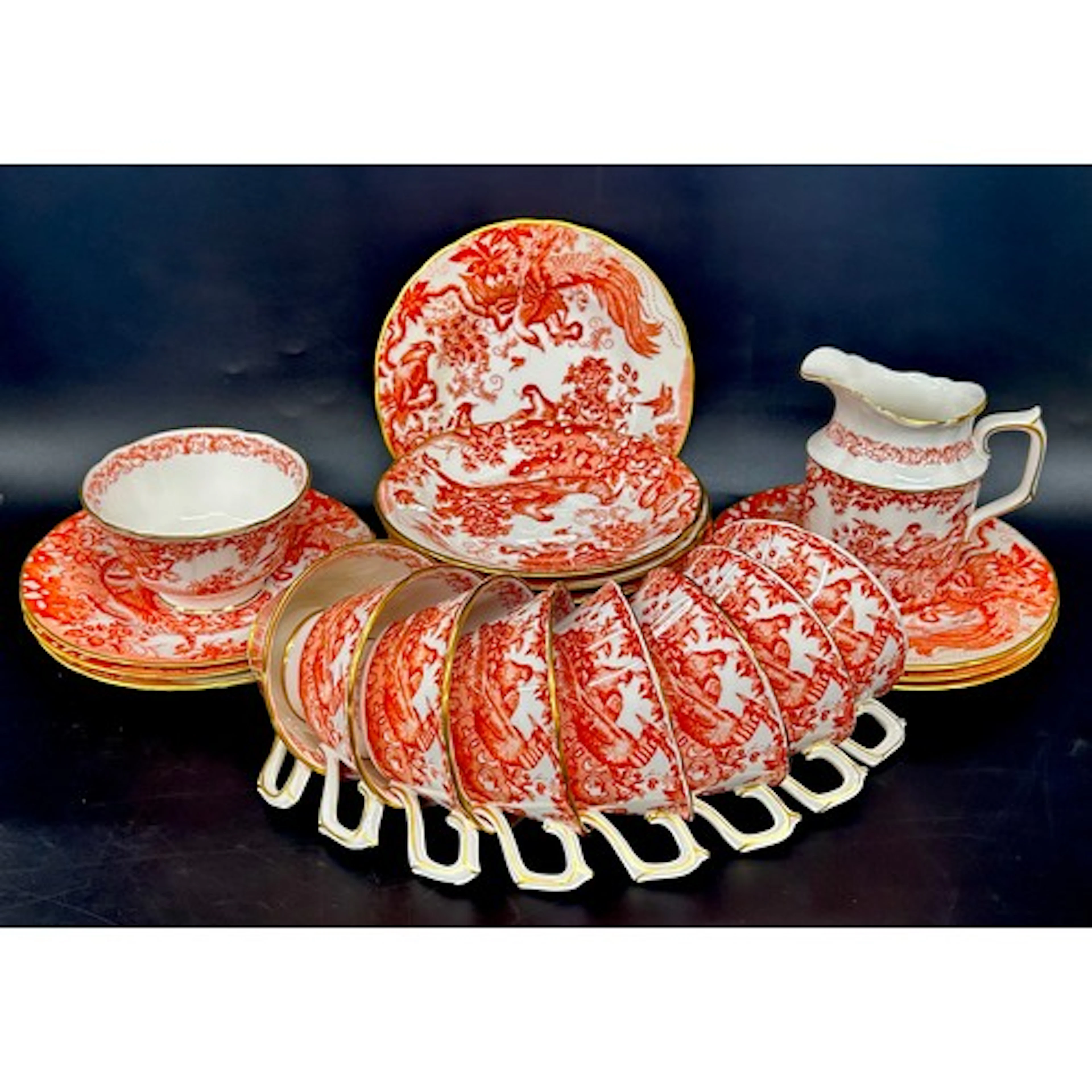 A Royal Crown Derby Red Aves pattern tea service to include ...