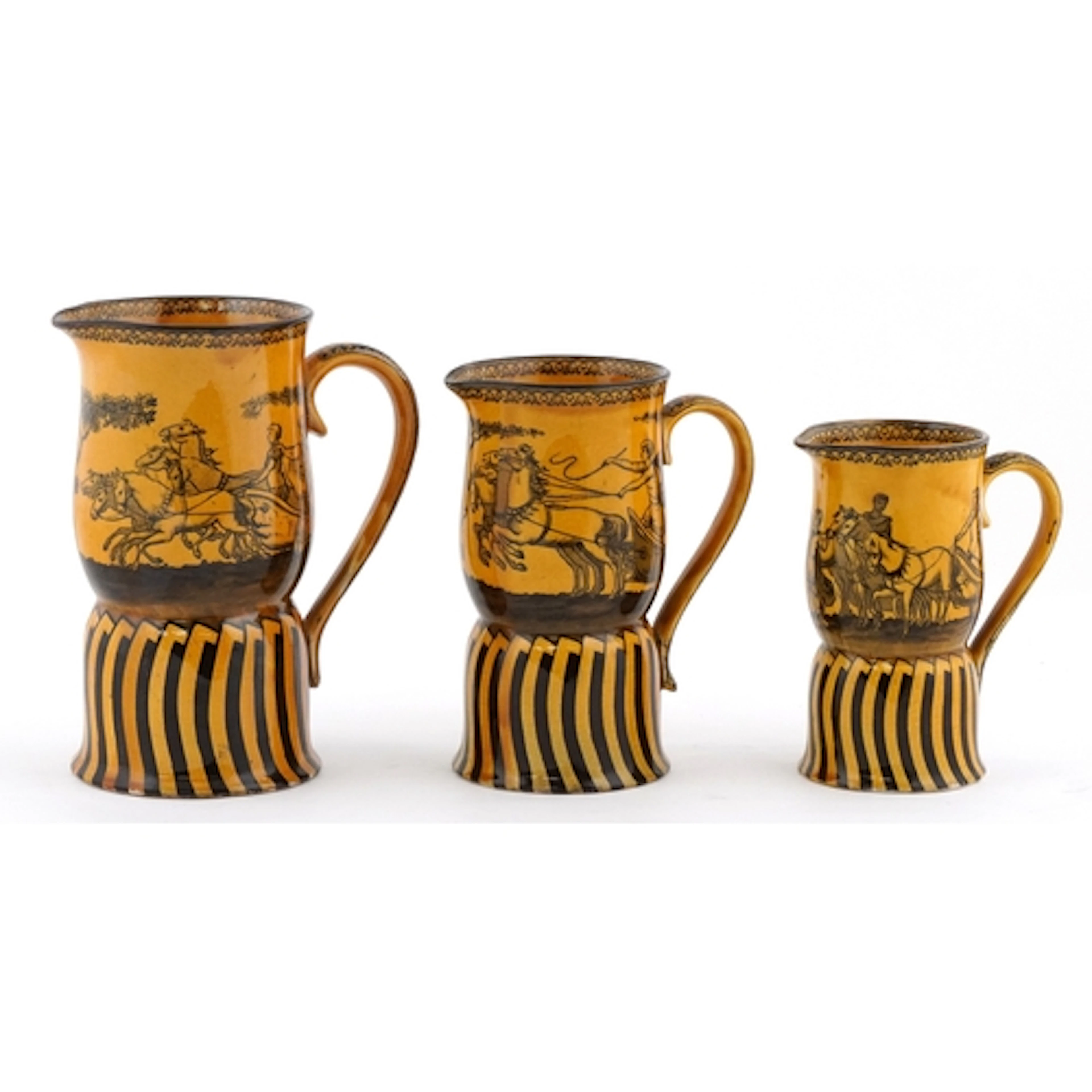 Doulton Burslem pottery jugs in the Isthmian Games pattern, ...
