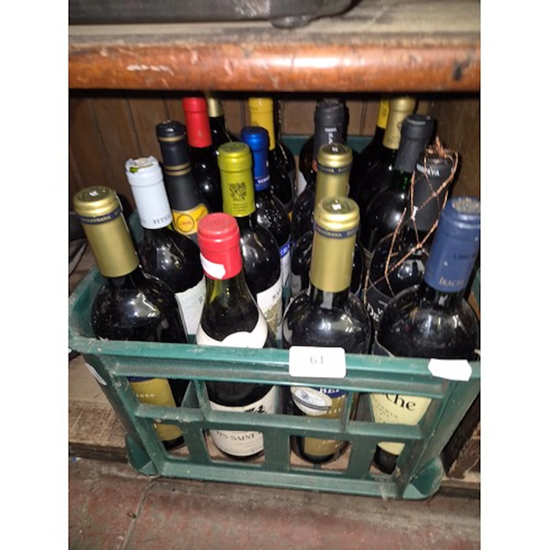 A crate containing 20 bottles of alcohol, mostly red wine.