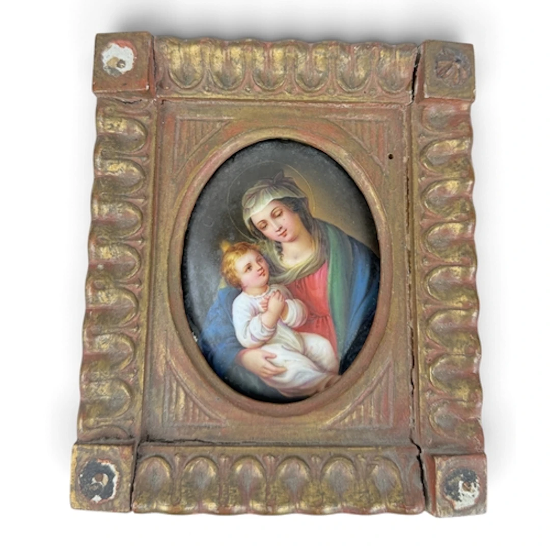 A 19TH CENTURY GERMAN PORCELAIN PLAQUE PAINTED WITH MADONNA ...