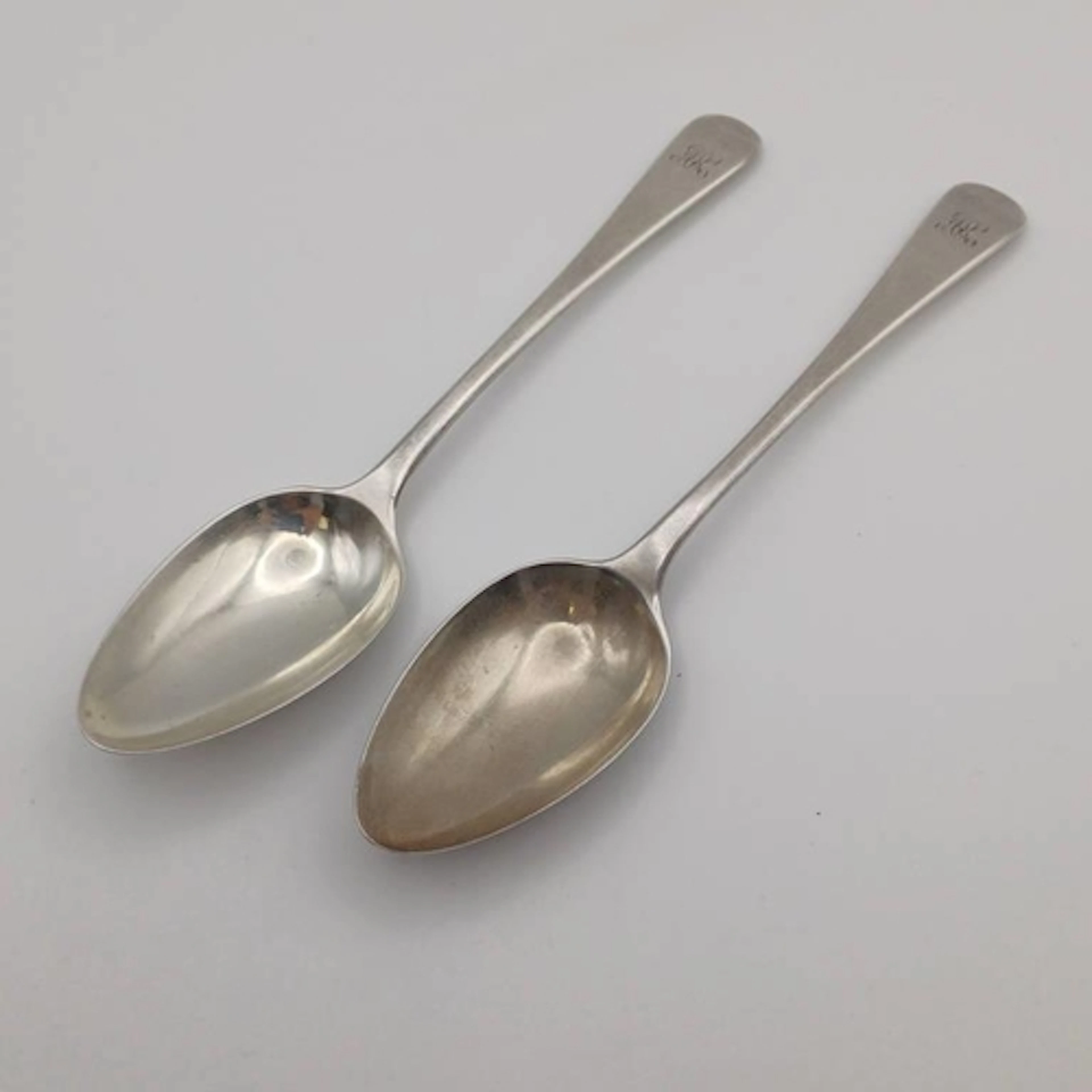 A PAIR OF GEORGE III SILVER DESSERT SPOONS BY WILLIAM ELEY 1...