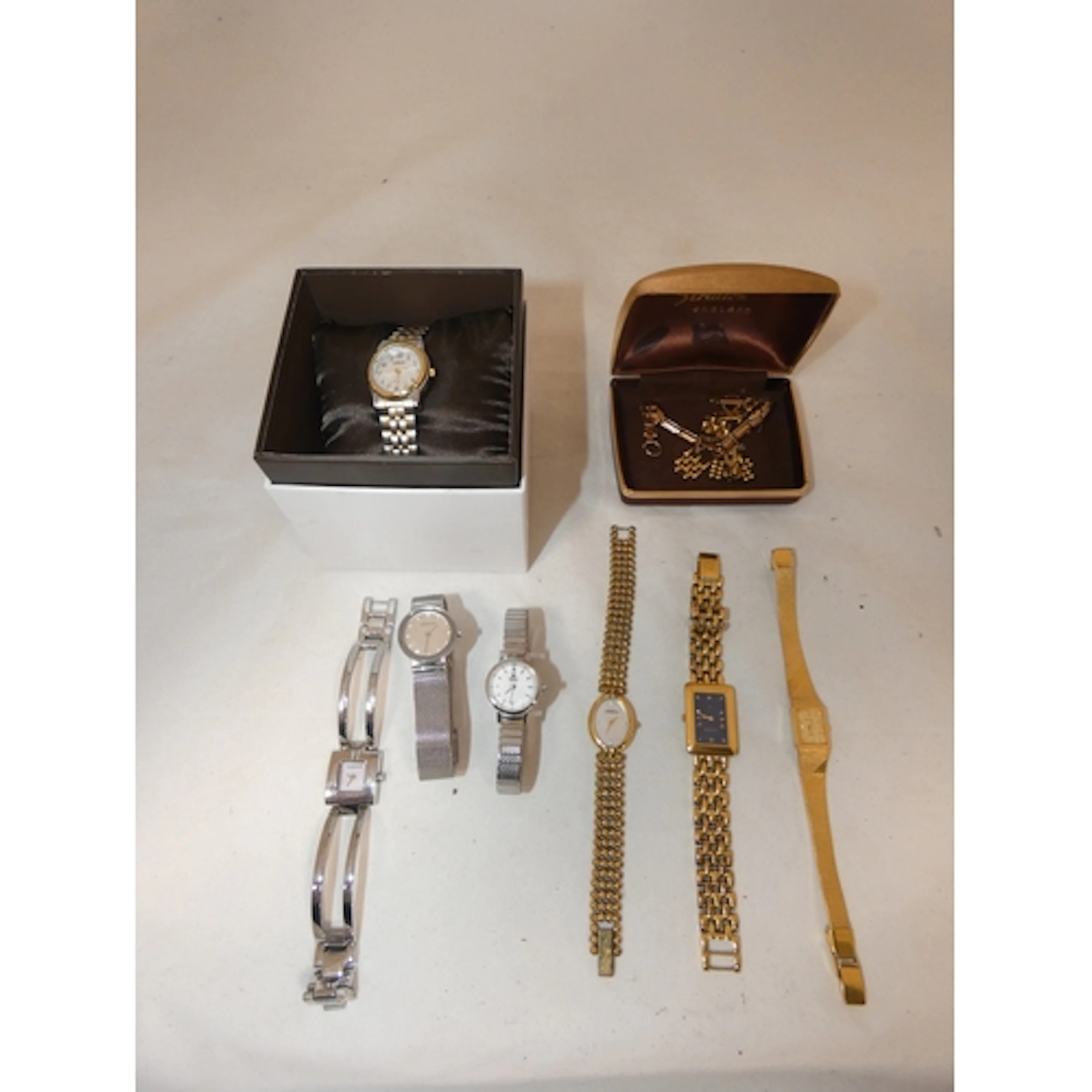 Bucherer Swiss-made lady's wristwatch with tank-style dial, ...