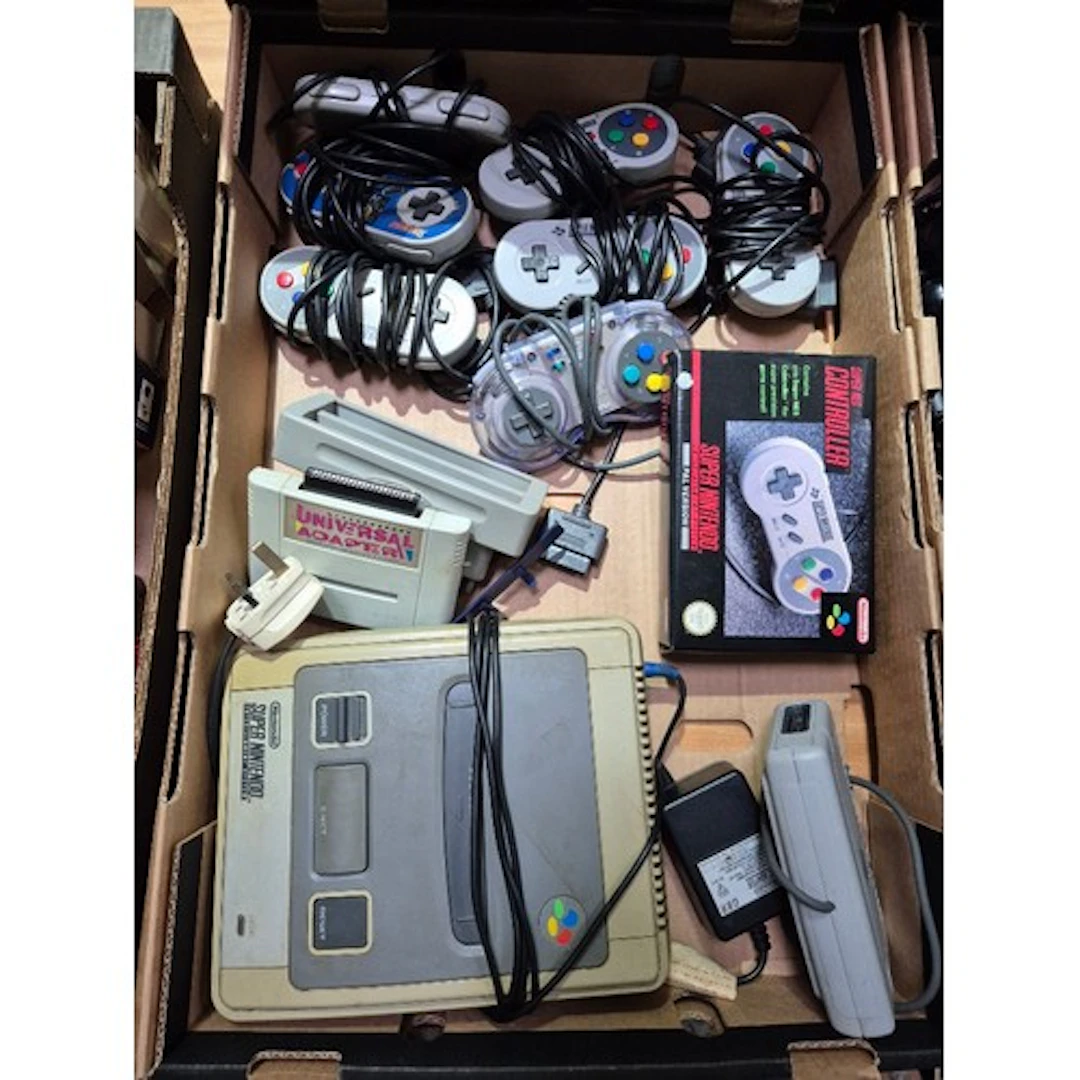 A Super Nintendo Entertainment System with 8 controllers.