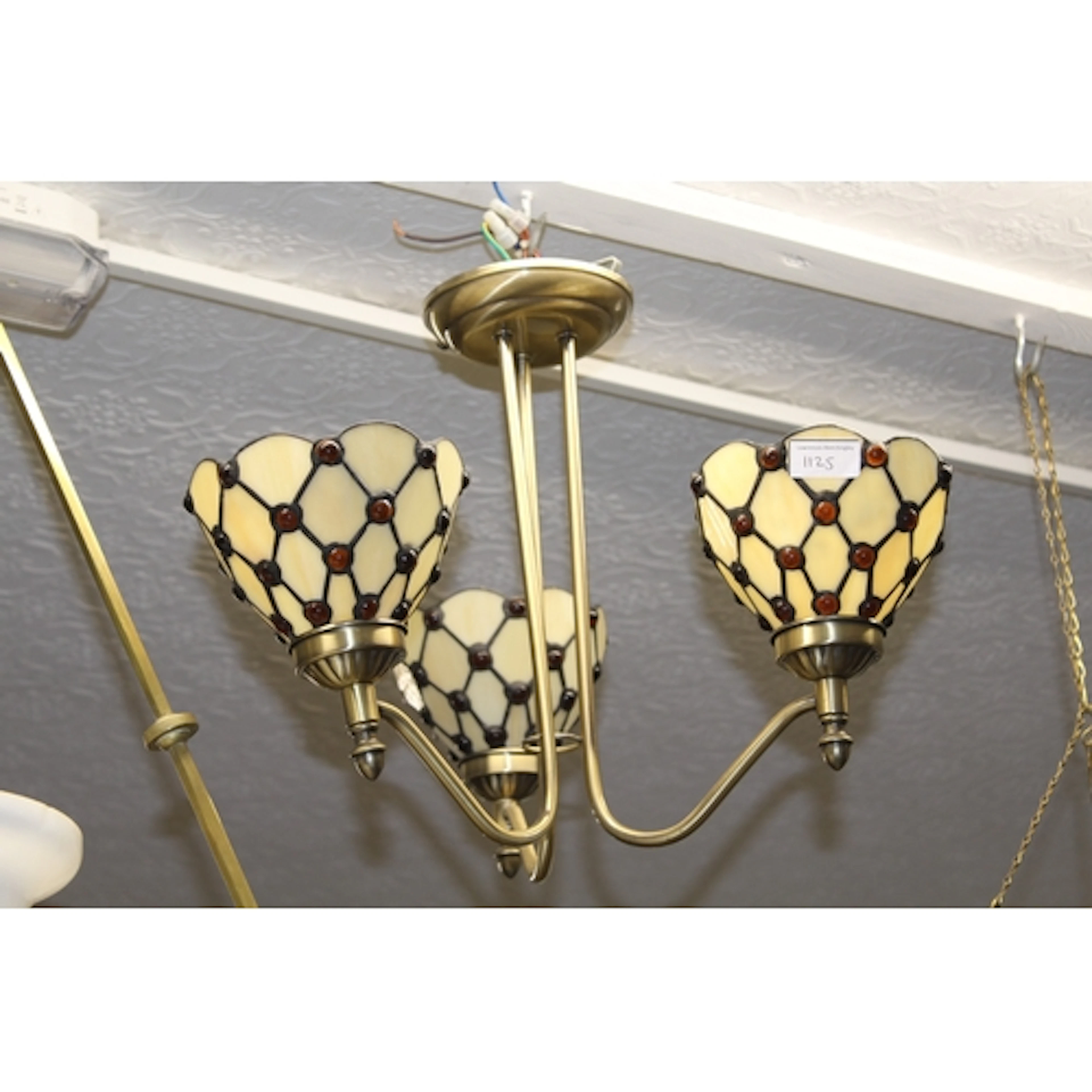 Pair of brass three branch chandeliers with leaded Tiffany s...