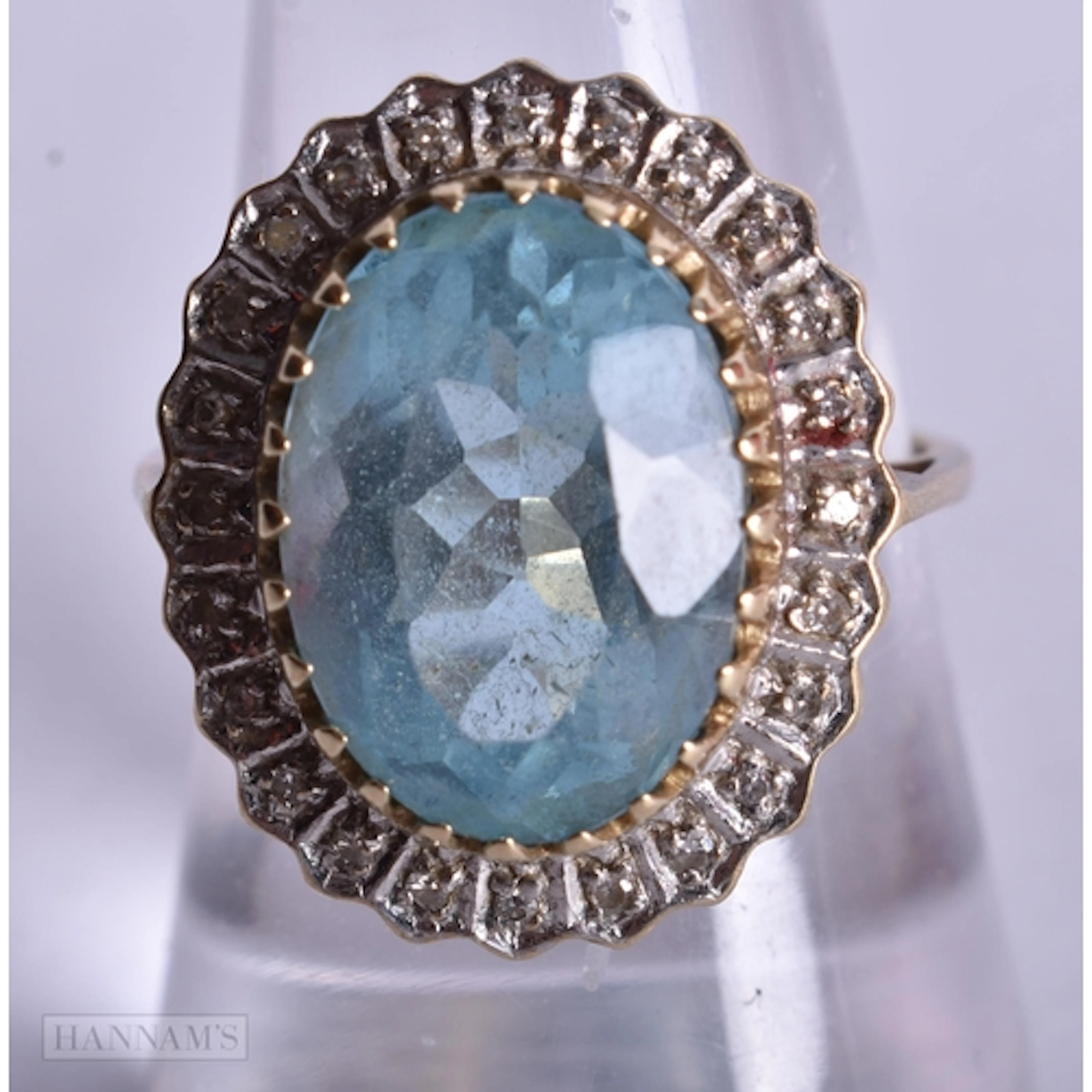 9ct gold blue topaz diamond cocktail ring (4.8g). O.