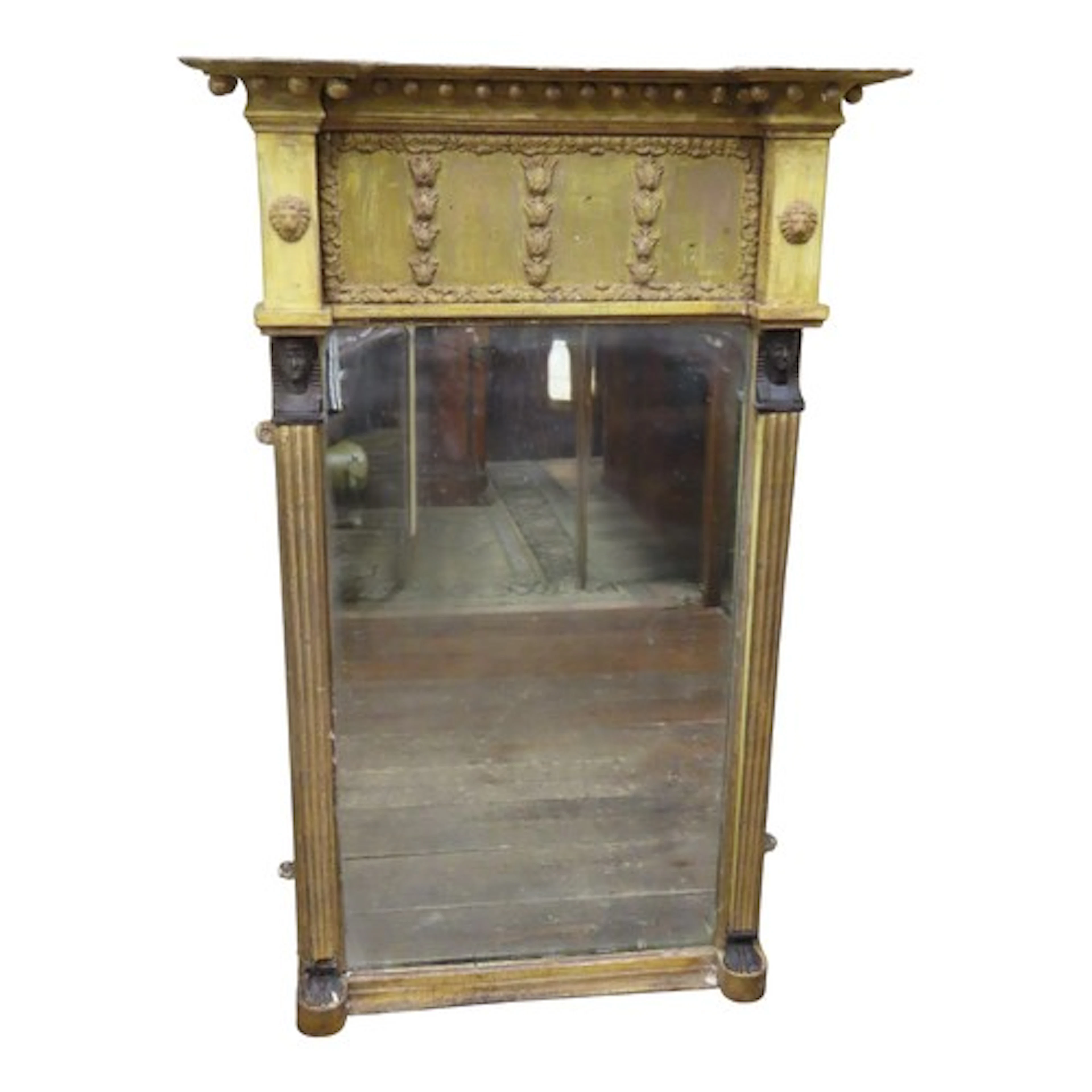 A Regency period Egyptian revival giltwood pier glass with a...