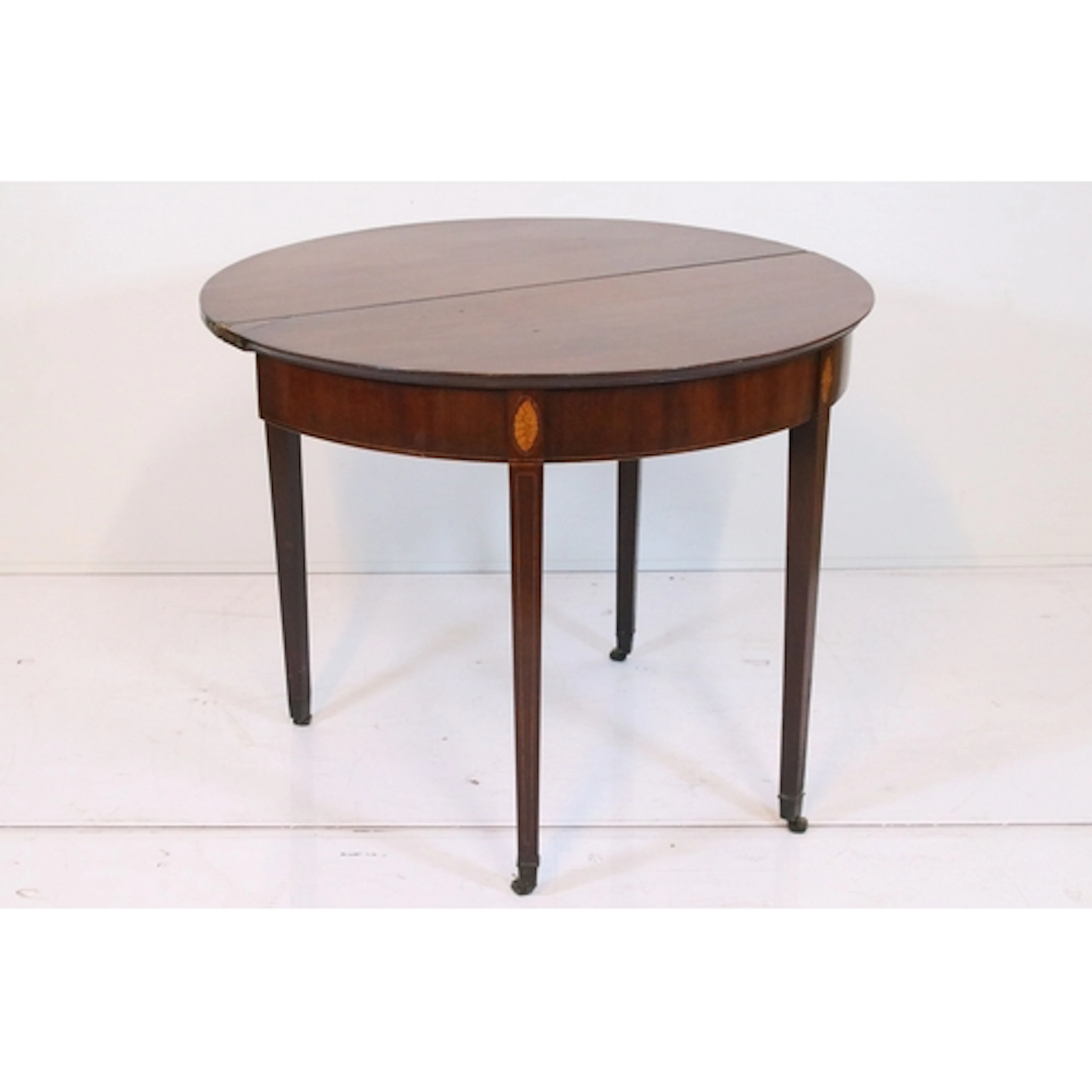 19th century mahogany demi-lune card table, having fold over...