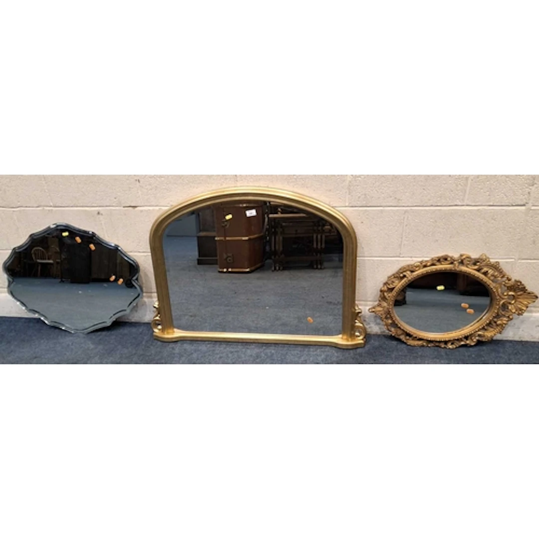 A GILT WOOD BEVELLED EDGE OVER MANTEL MIRROR, along with two...