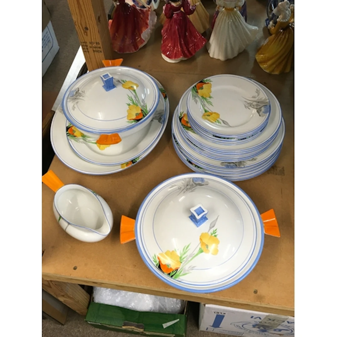 A Shelley tea service poppy pattern W12229 including plates,...