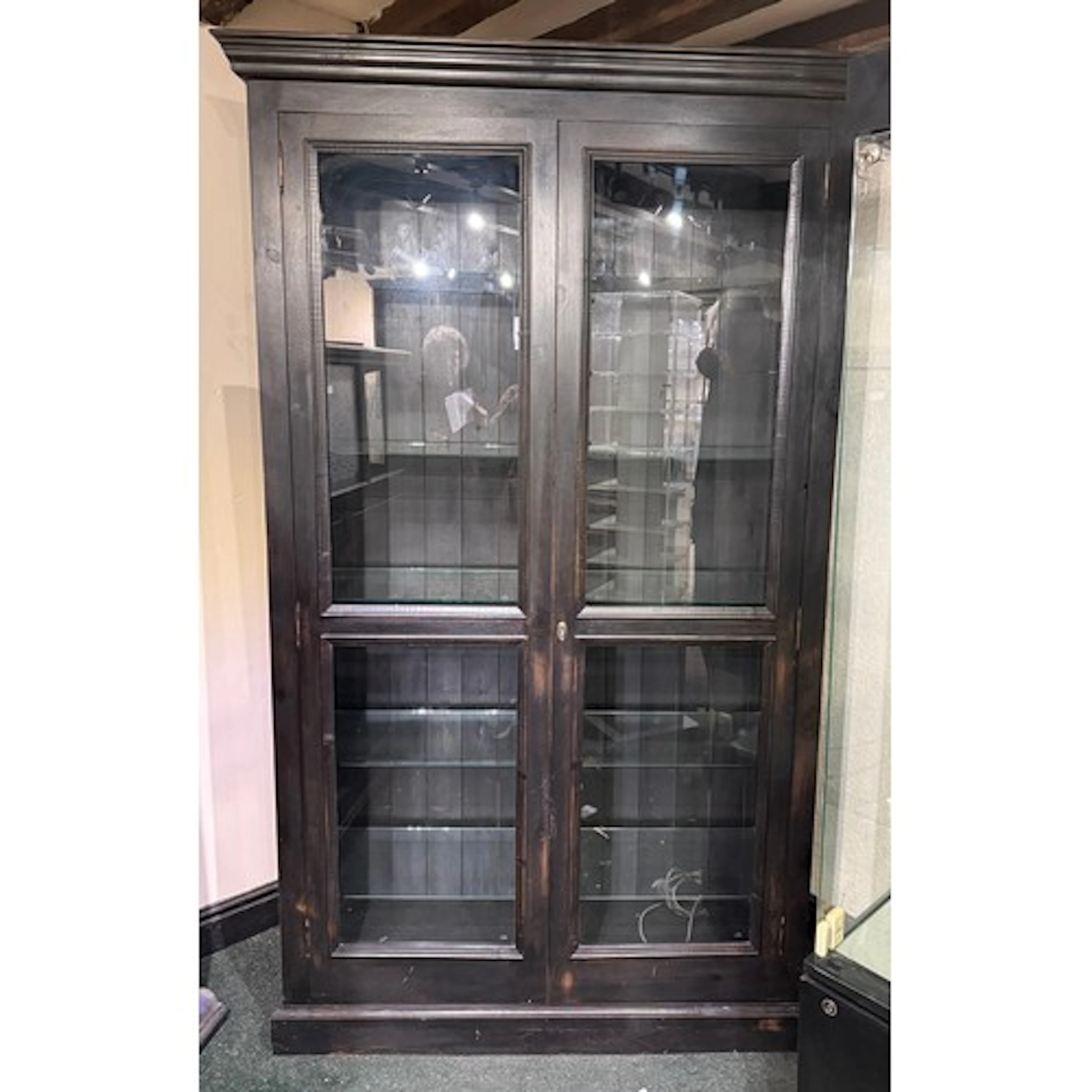 A modern two door display cabinet with glass shelves. 120cm ...