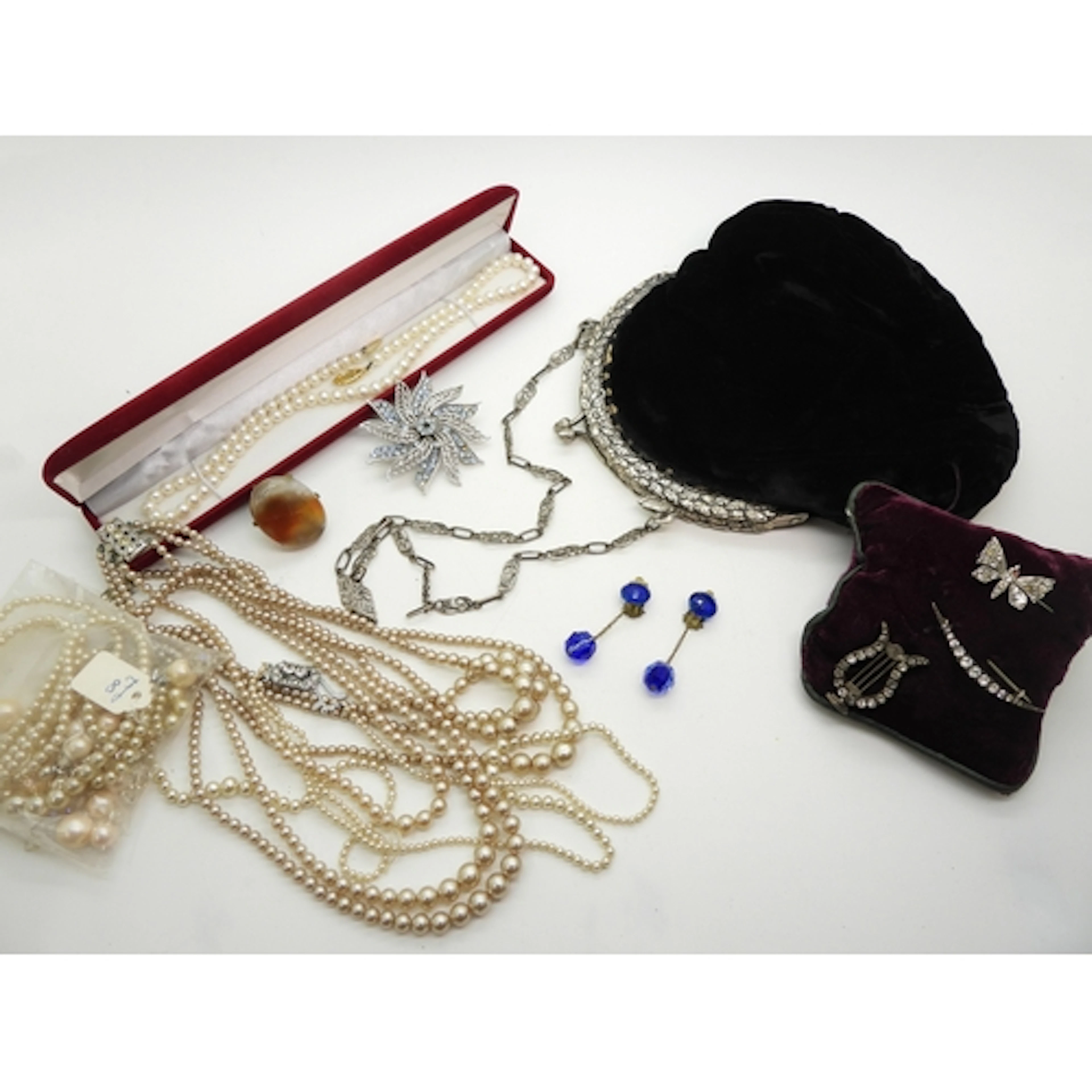 A continental 800 silver framed handbag with a theme of oak ...