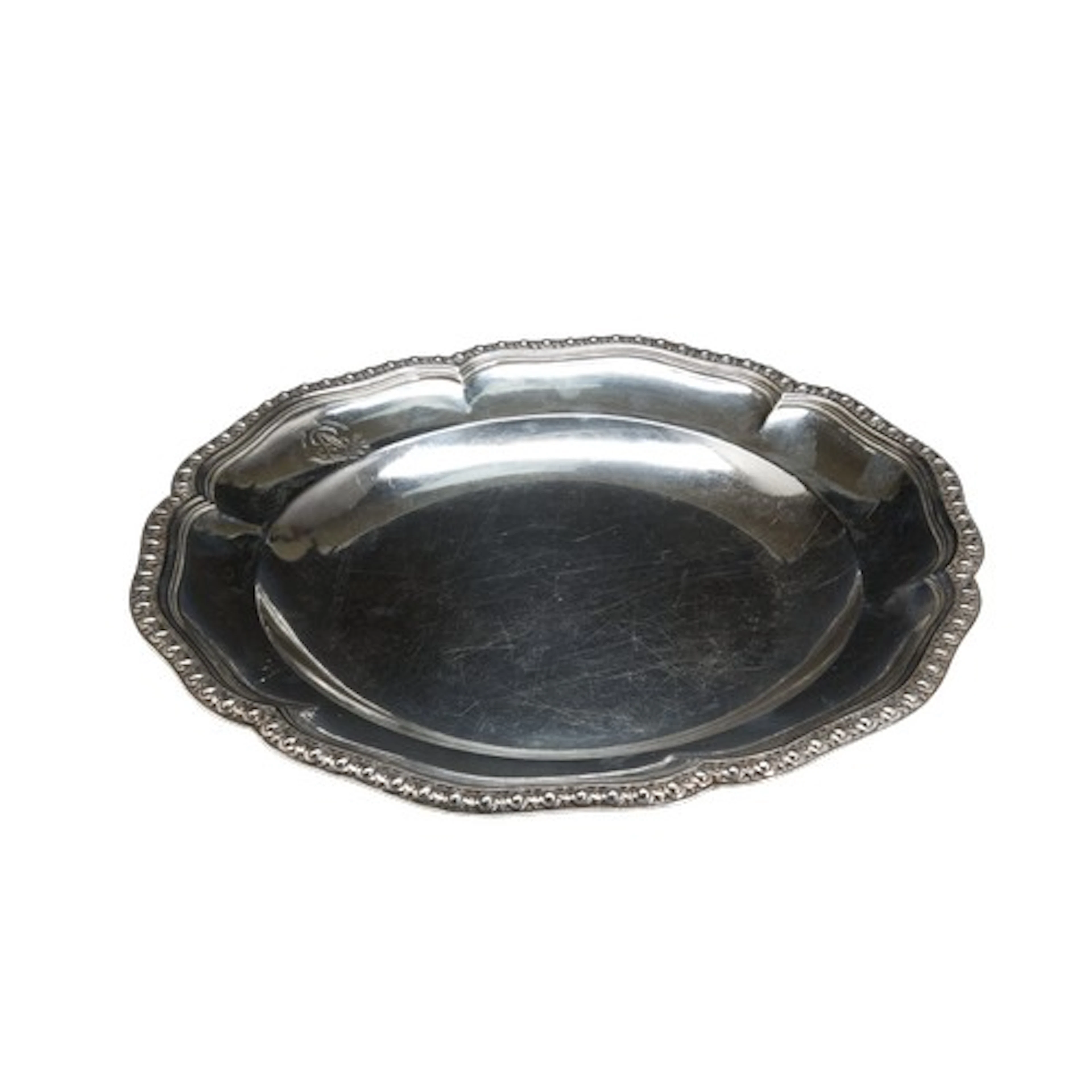 A LARGE DISH WITH CAST OVOLO BORDER, FRENCH 18TH CENTURY. St...