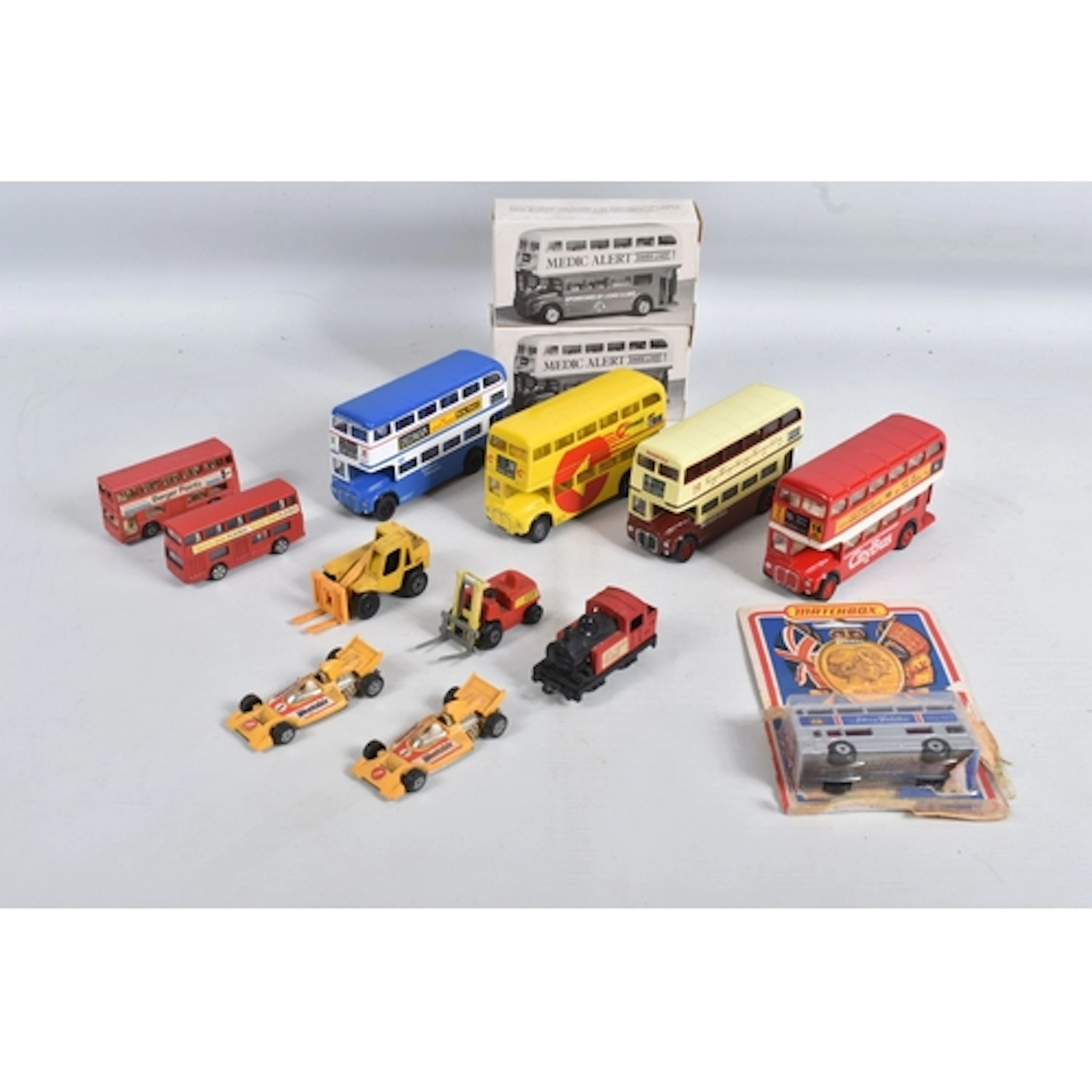 A QUANTITY OF BOXED AND UNBOXED CORGI TOYS A.E.C. ROUTEMASTE...