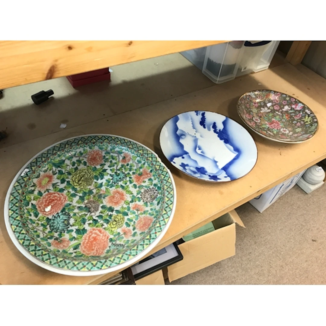 Three Chinese porcelain chargers 52 to 36cm wide. Some damag...