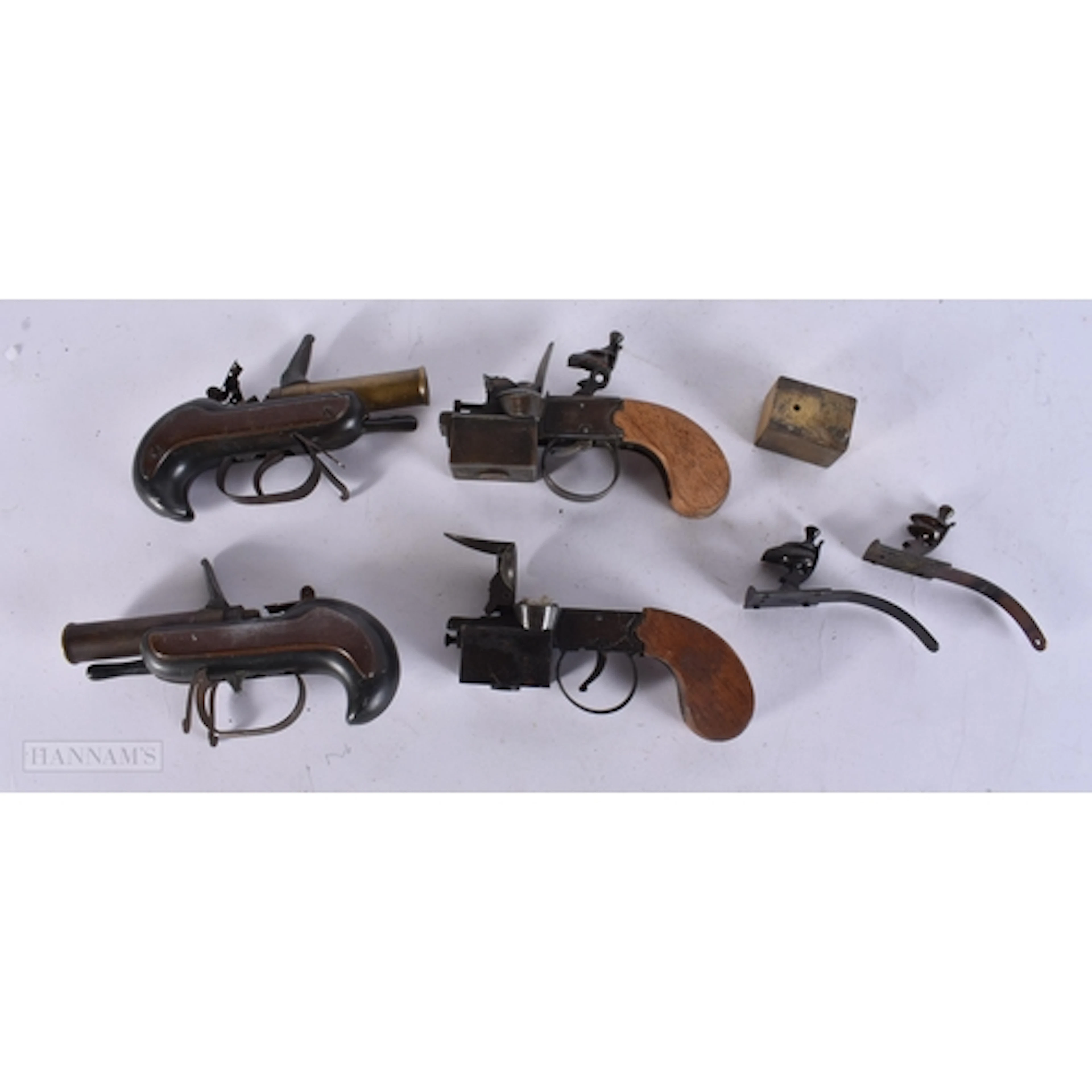 A COLLECTION OF ANTIQUE PISTOL LIGHTER PARTS AND SPARES. (qt...