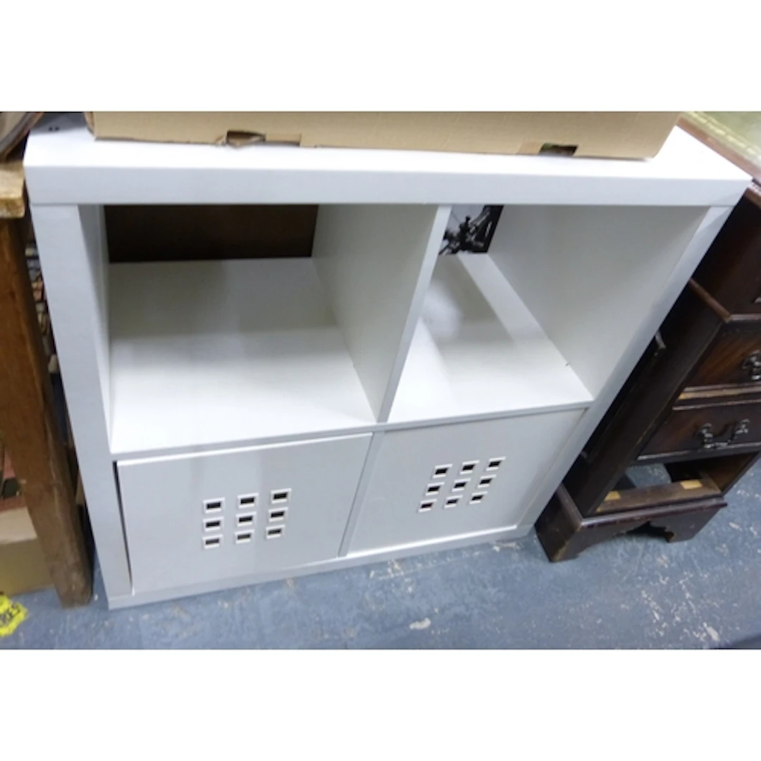 Two modern stacking cube book shelves.