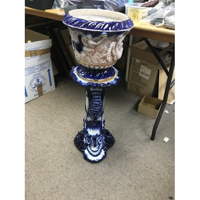 A Victorian style jardiniere and stand
