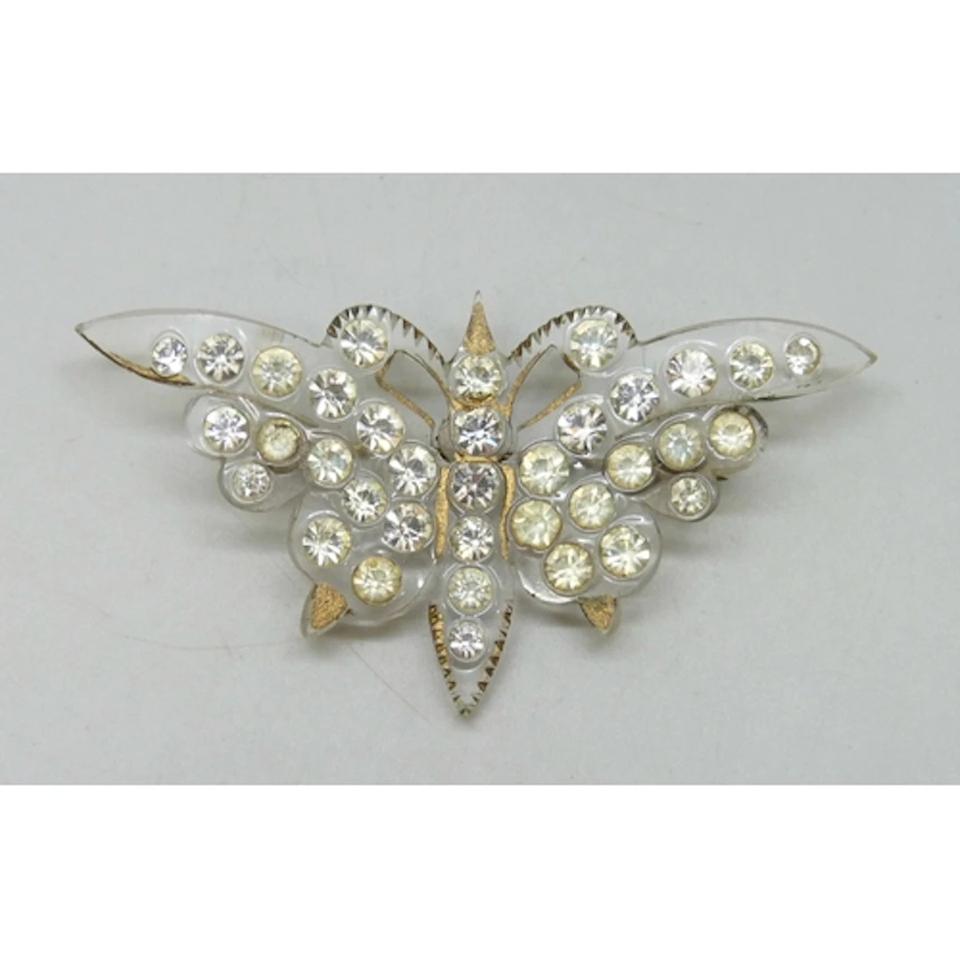 An Art Deco early plastic paste set butterfly brooch, 7.5cm