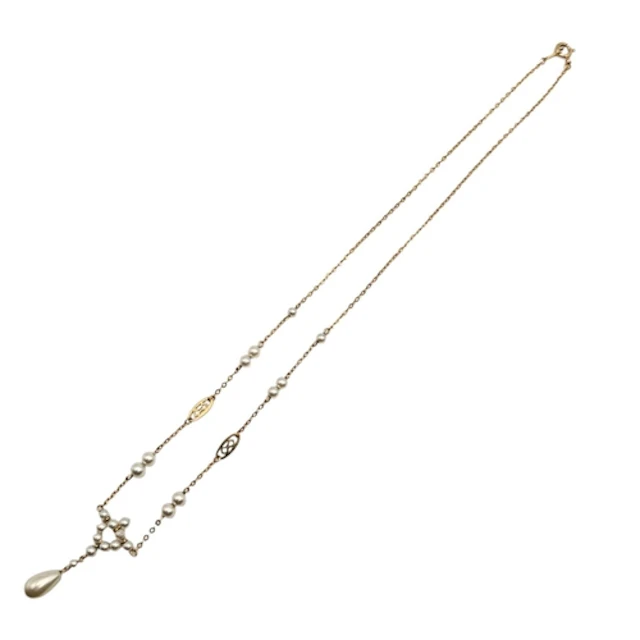 AN EDWARDIAN 9CT GOLD AND SEED PEARL FESTOON NECKLACE. Stam...