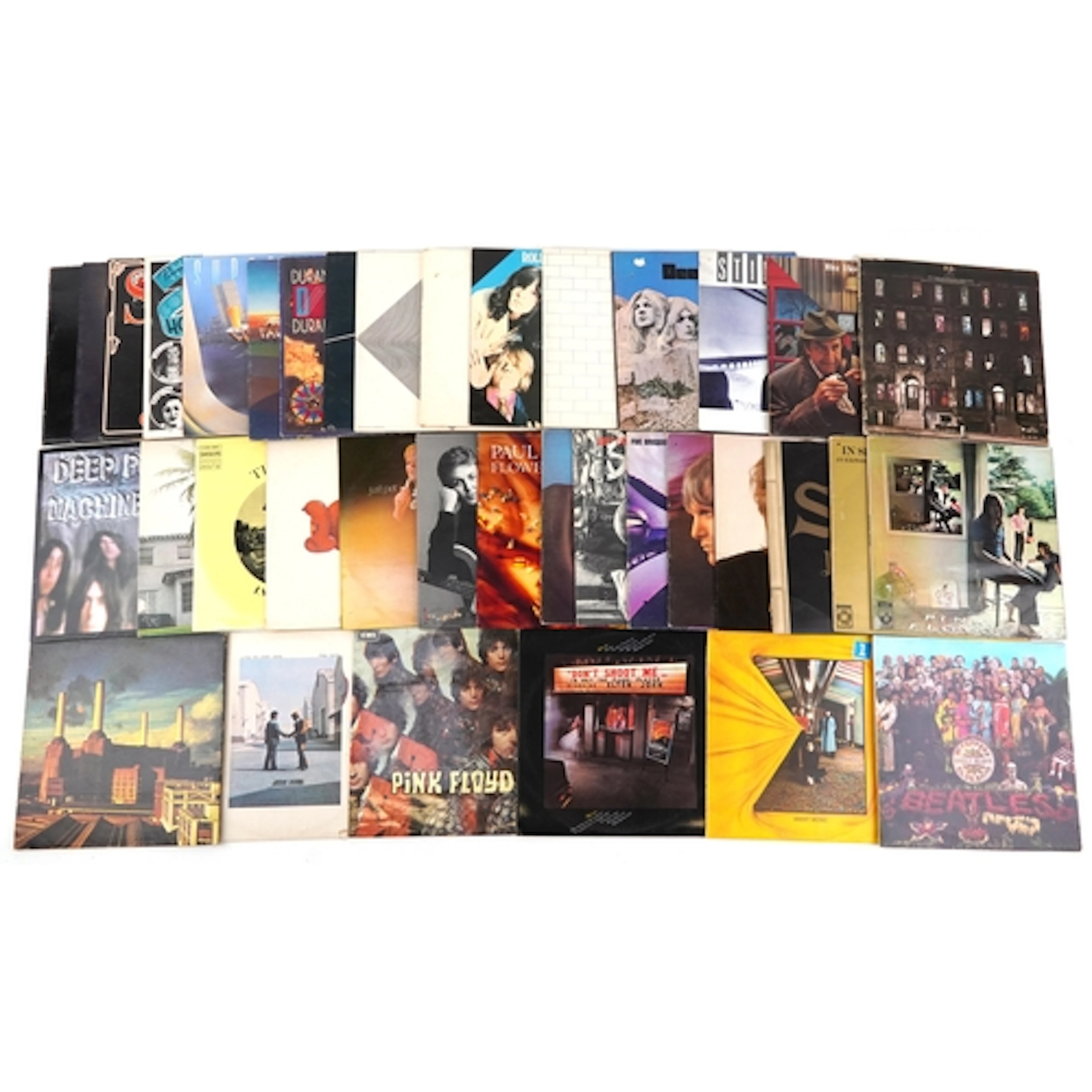 Collection of vinyl LP records including Elton John, Eric Cl...