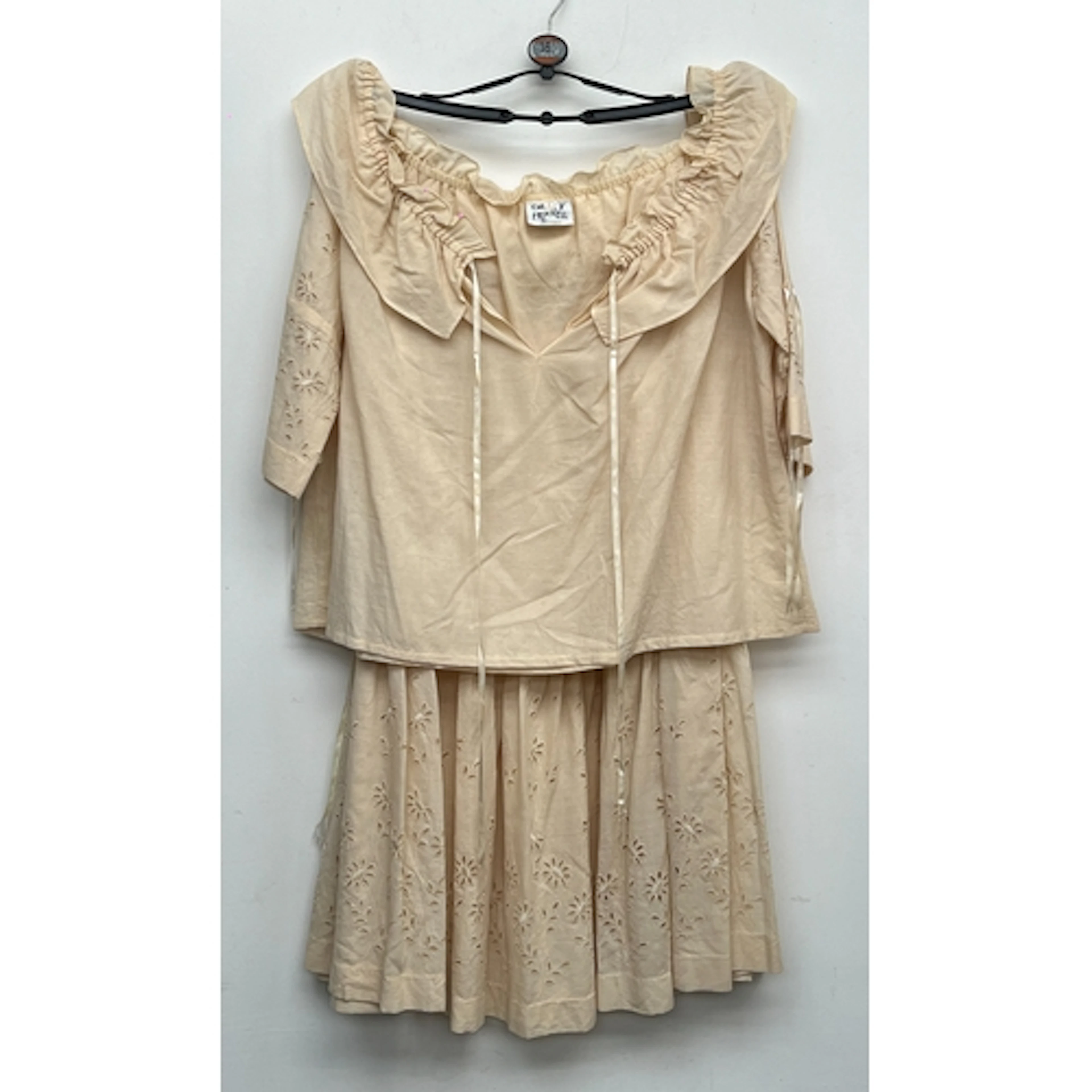 A vintage Cherry Frizzell cream skirt and top, size 1