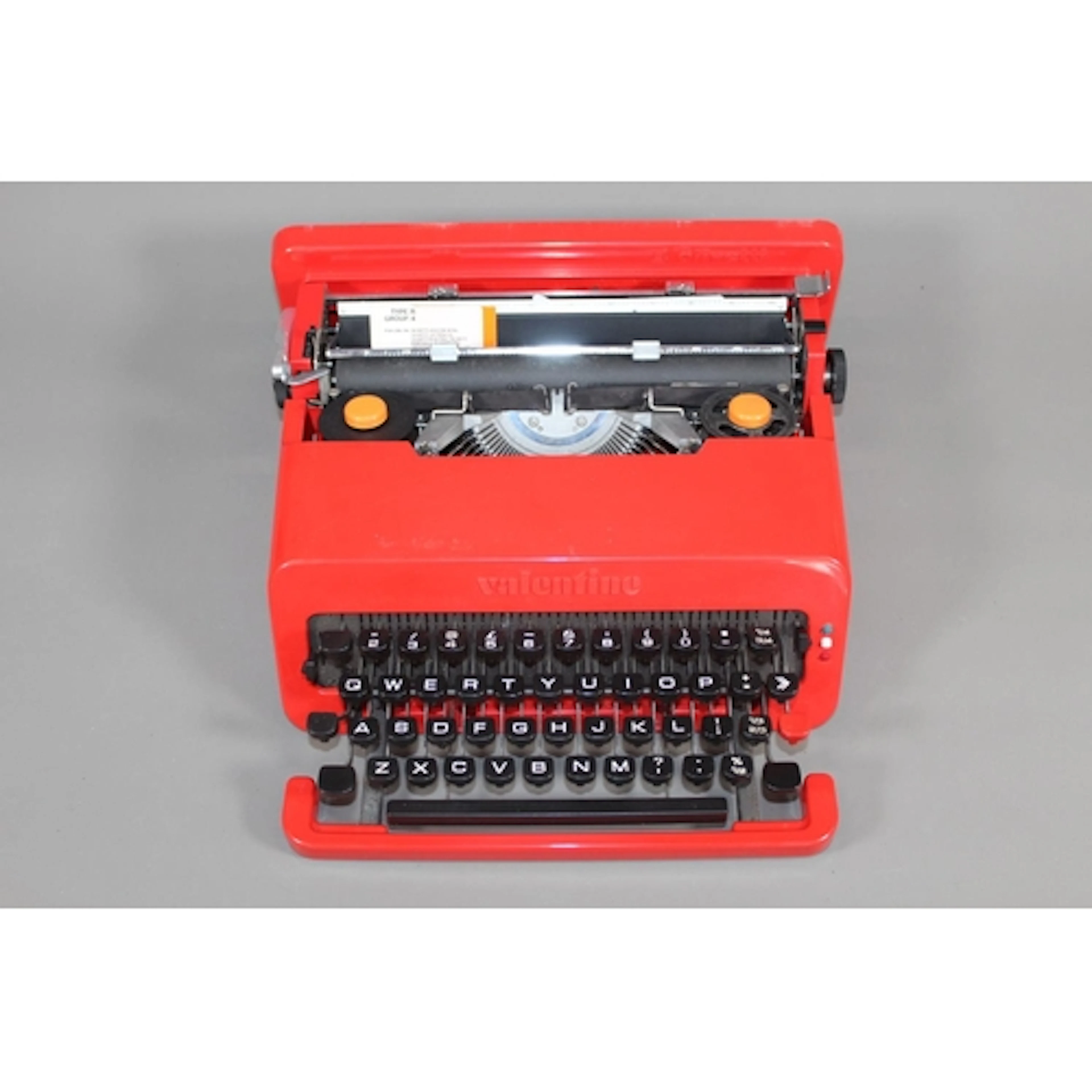 Olivetti Valentine typewriter in red case.