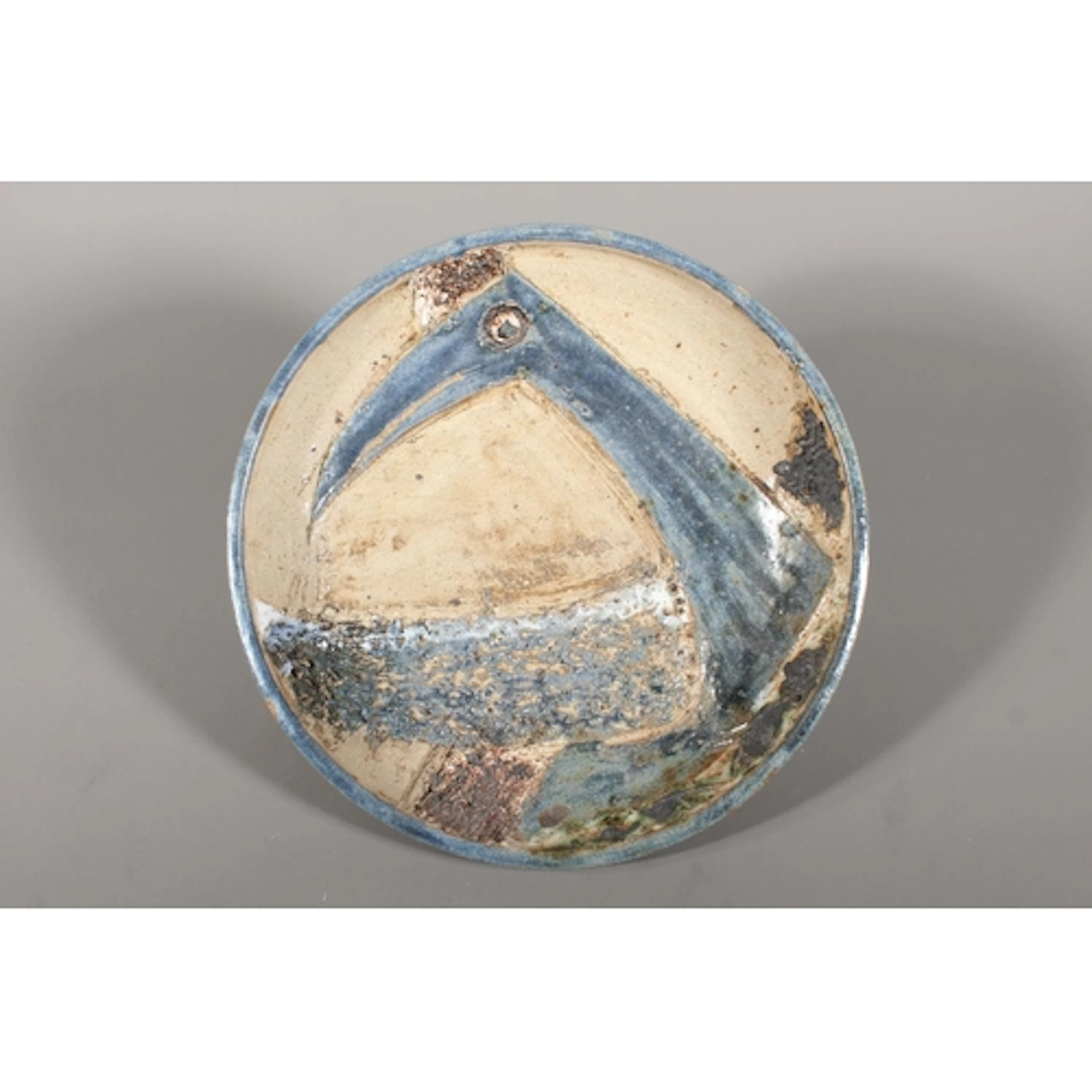 Oxshott Pottery, a studio pottery shallow bowl with blue bir...