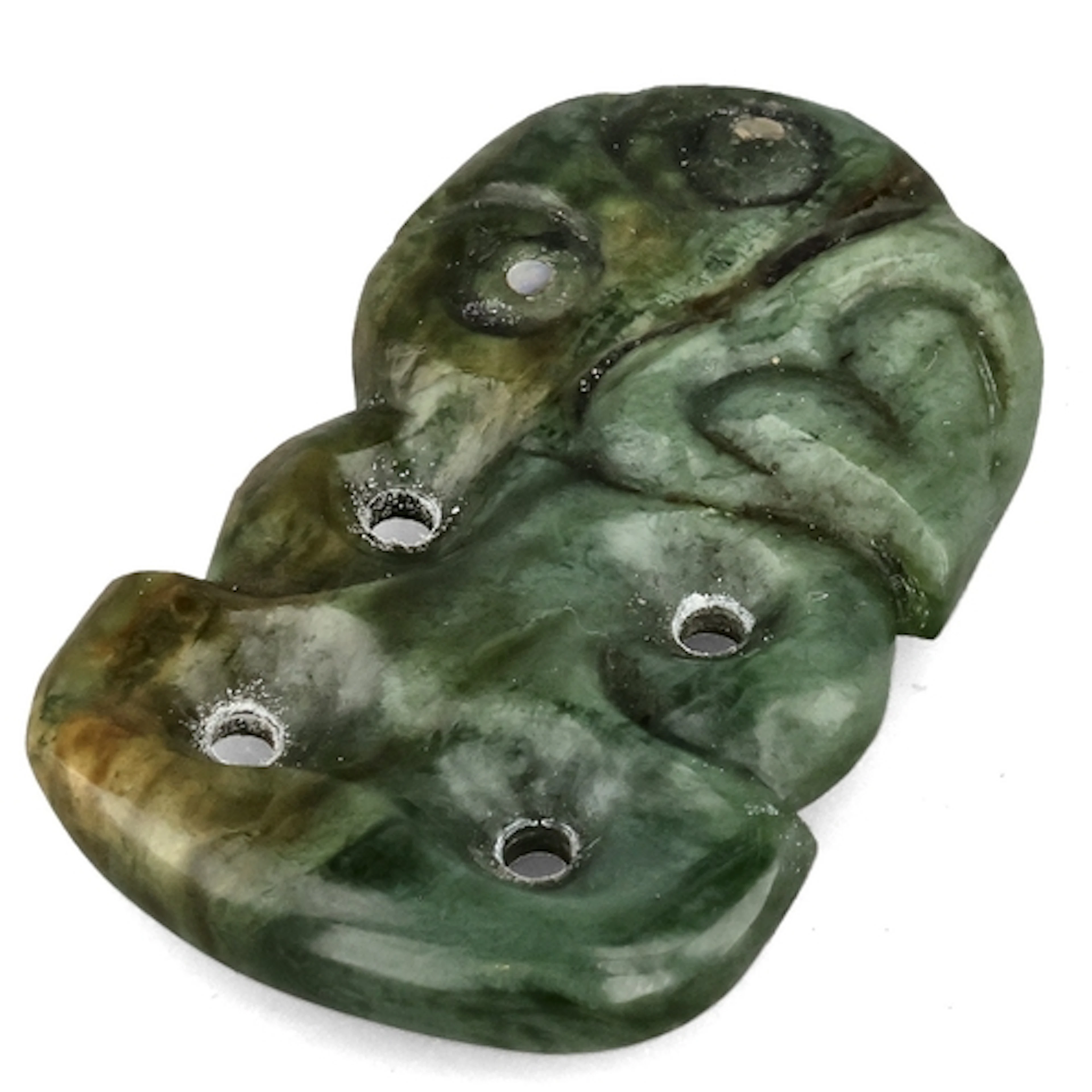 A MAORI HEI-TIKI CARVING With abalone eyes. 5.5 cm L...