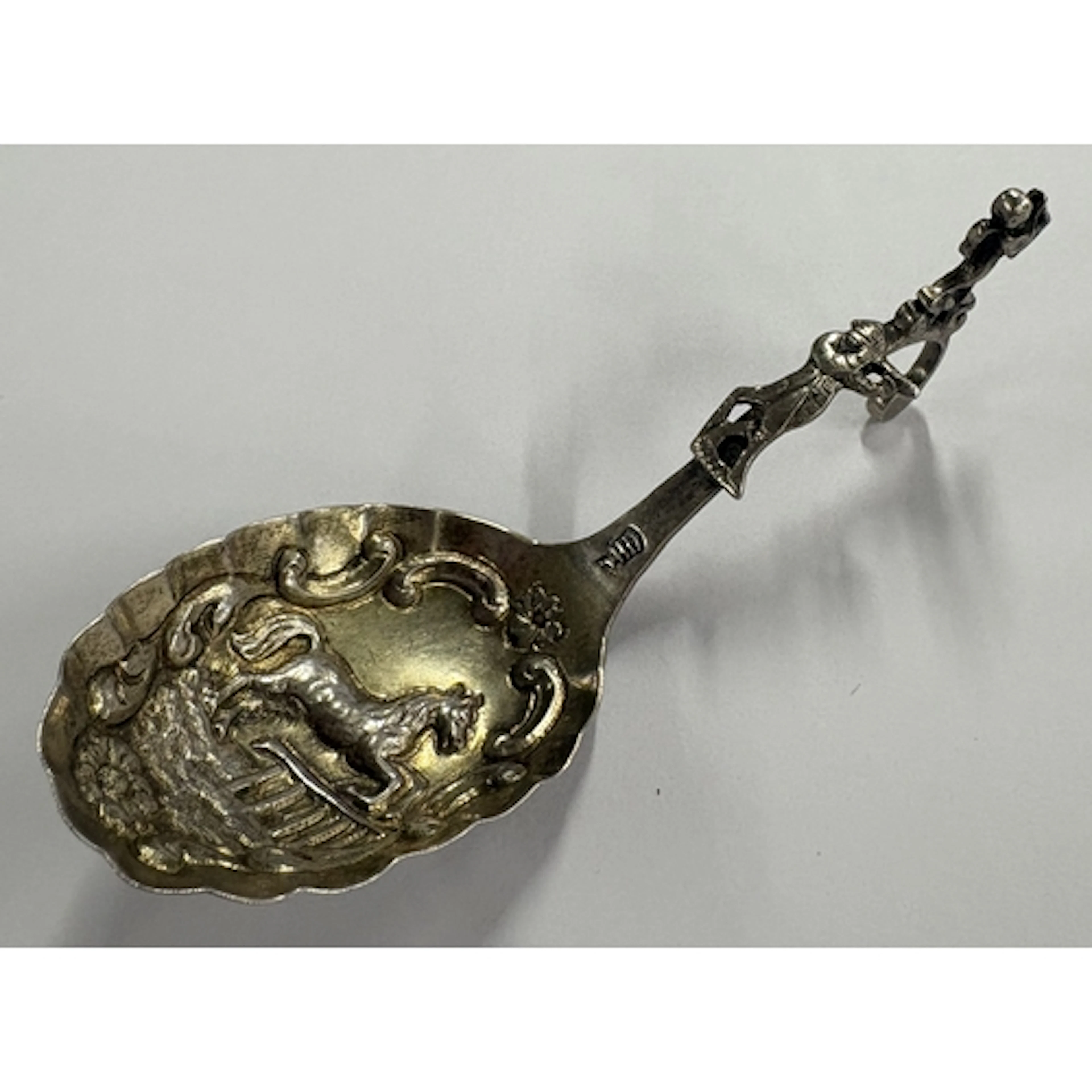 A Continental silver caddy spoon with horse decoration to bo...