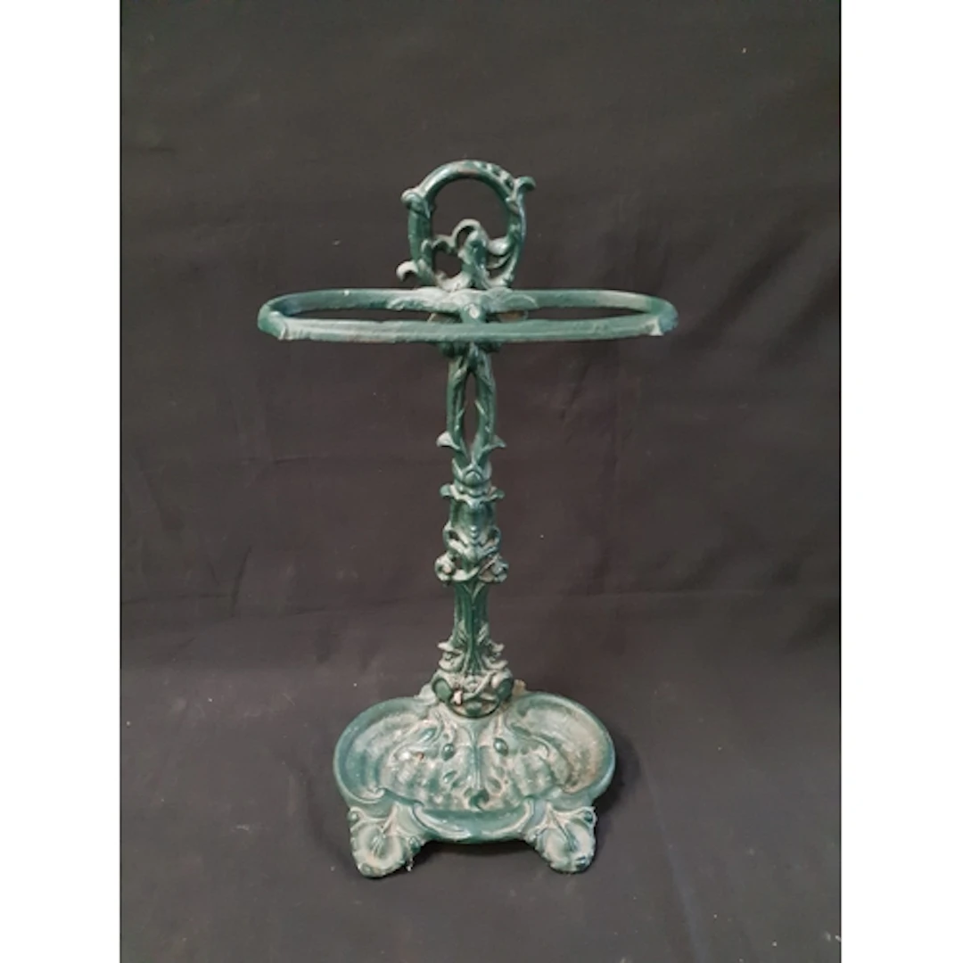 VICTORIAN CAST IRON UMBRELLA STAND of ornate Rococo design, ...