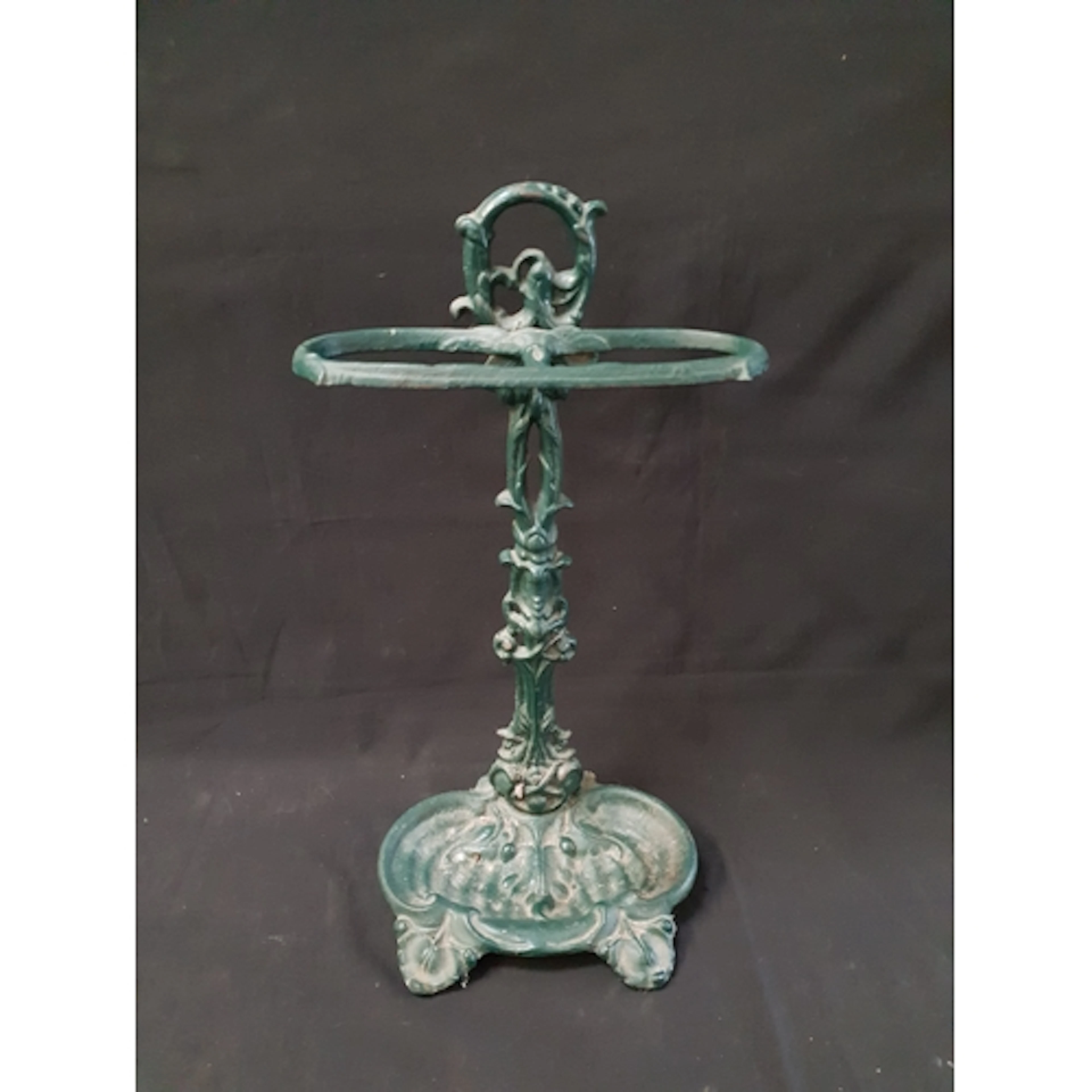 VICTORIAN CAST IRON UMBRELLA STAND of ornate Rococo design, ...
