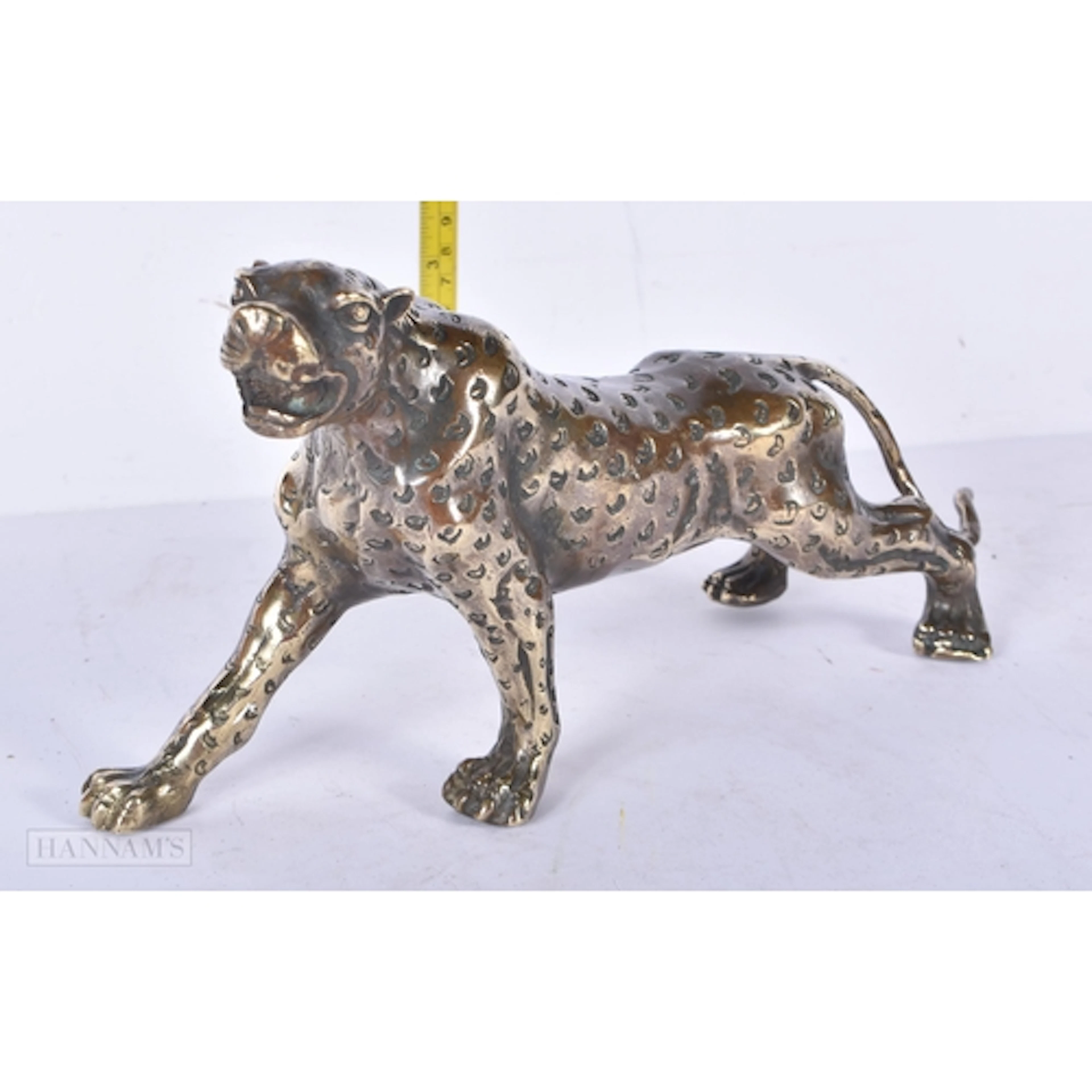 A copper Leopard sculpture 27 x 14cm