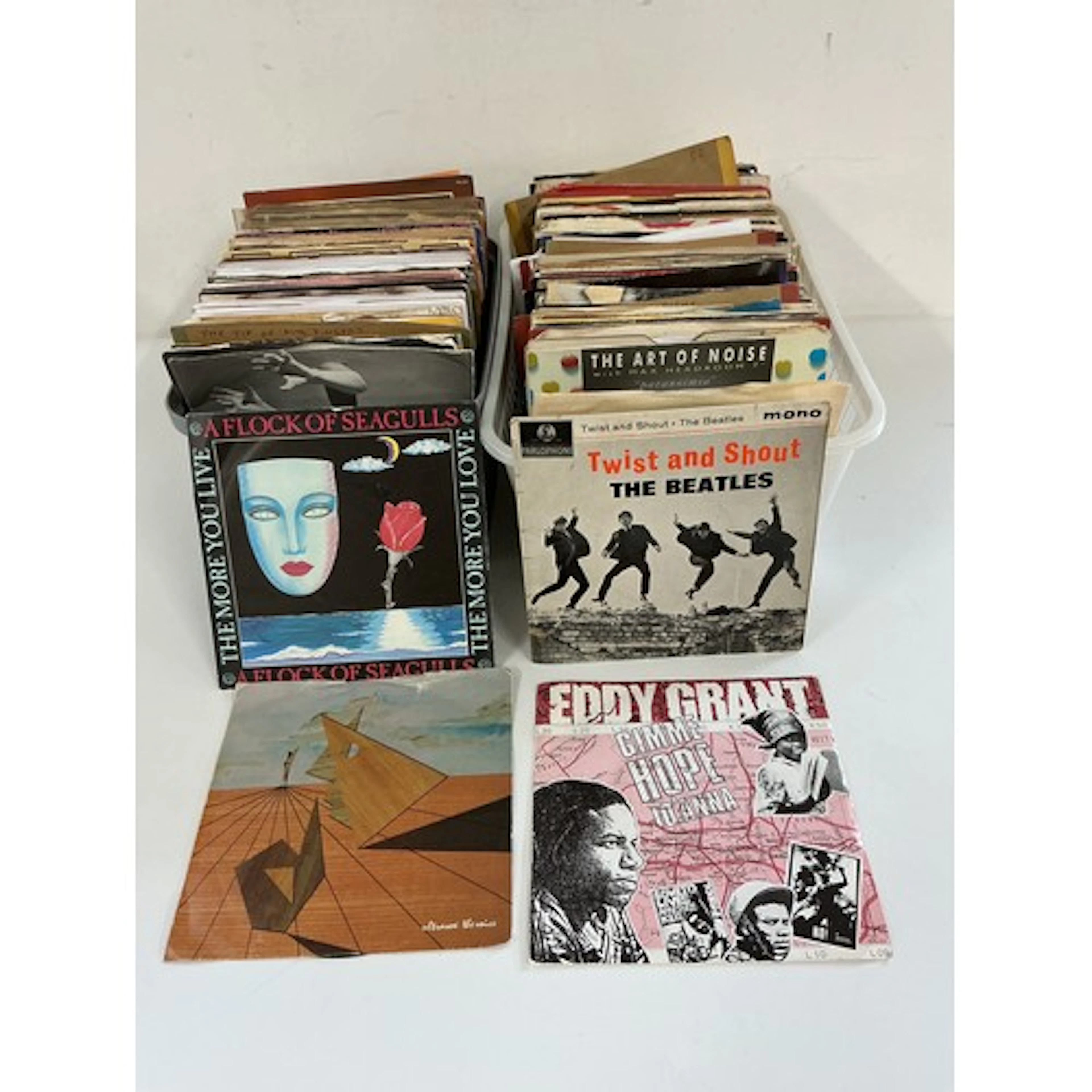 A small collection of 7” singles and EPs by various artists ...