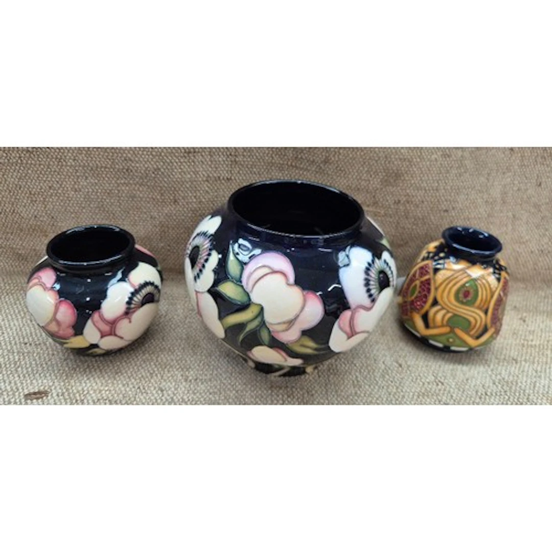 3 pieces of Moorcroft pottery. Squat vase with Staffordshire...