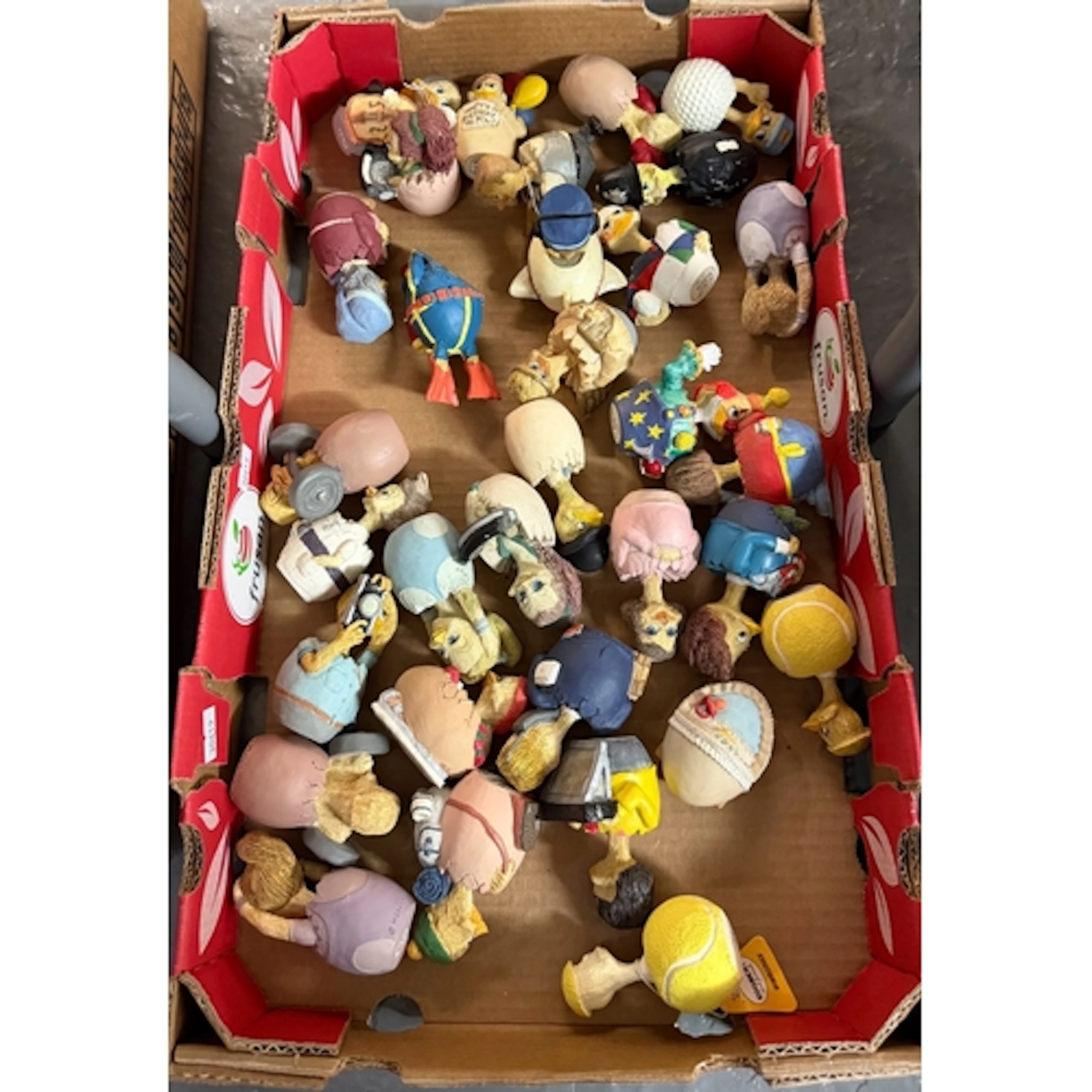 Box of assorted 'Eggberts' to include: photographer, cello p...