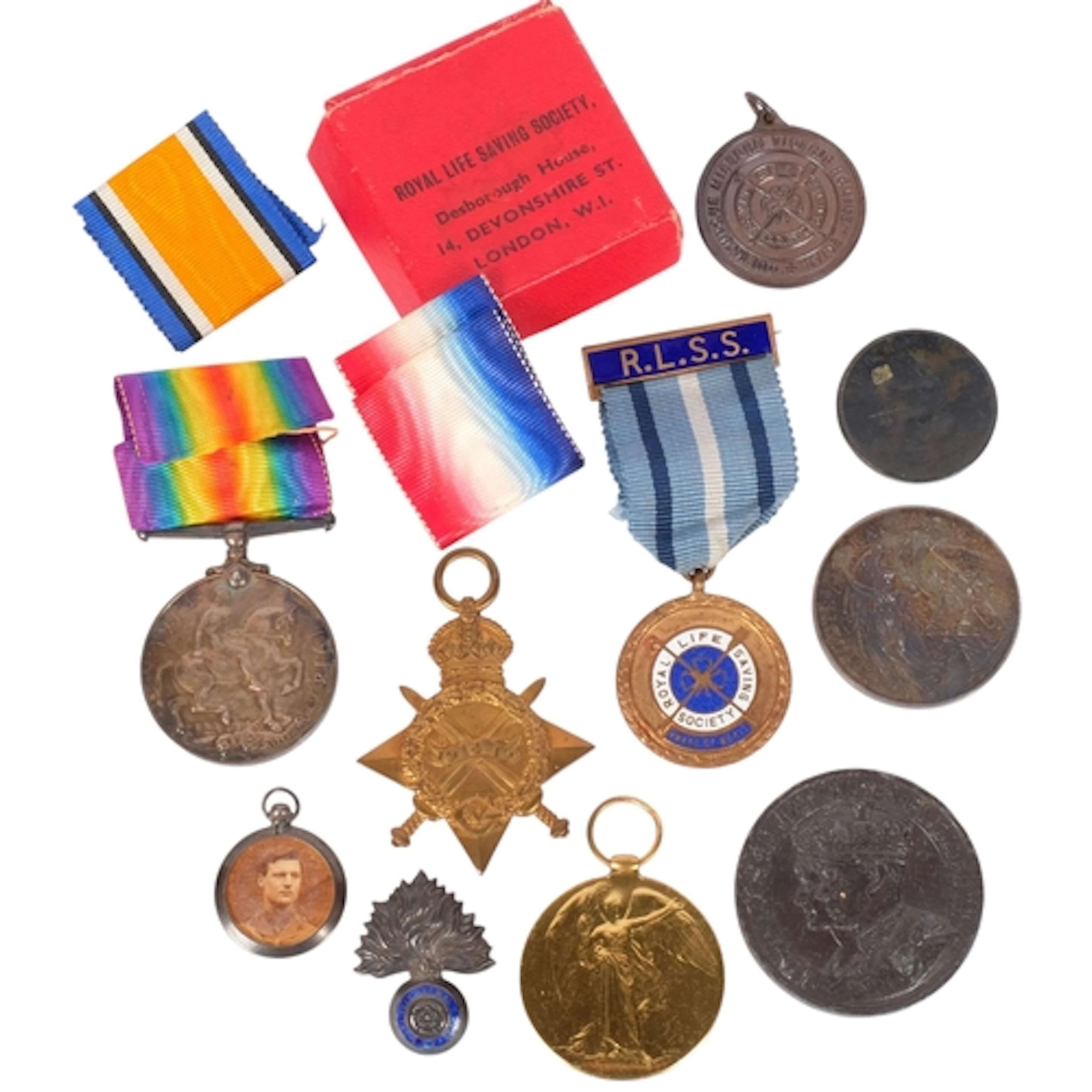 A collection of medals and medallions, including a 1914 War ...