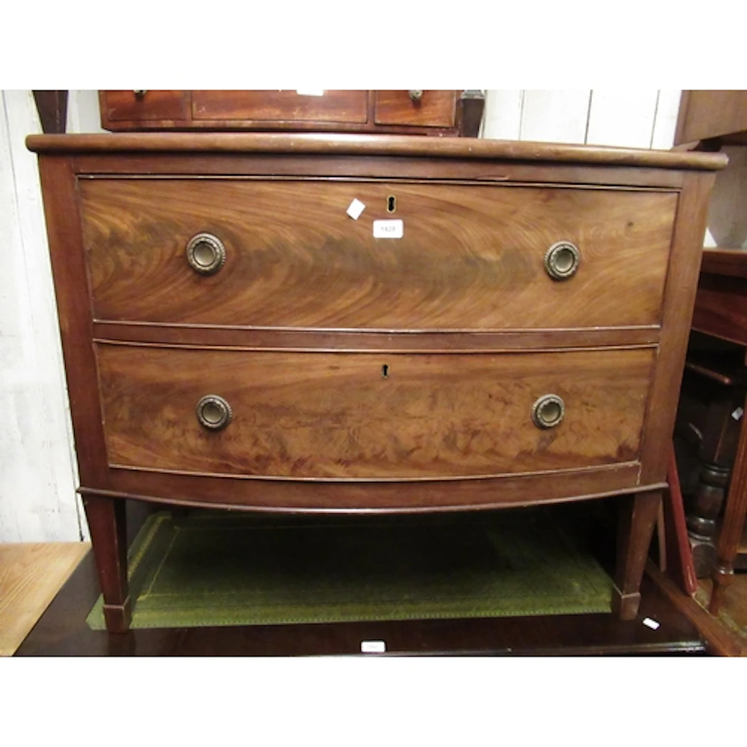 19th Century mahogany bow fronted chest, on stand, of two lo...