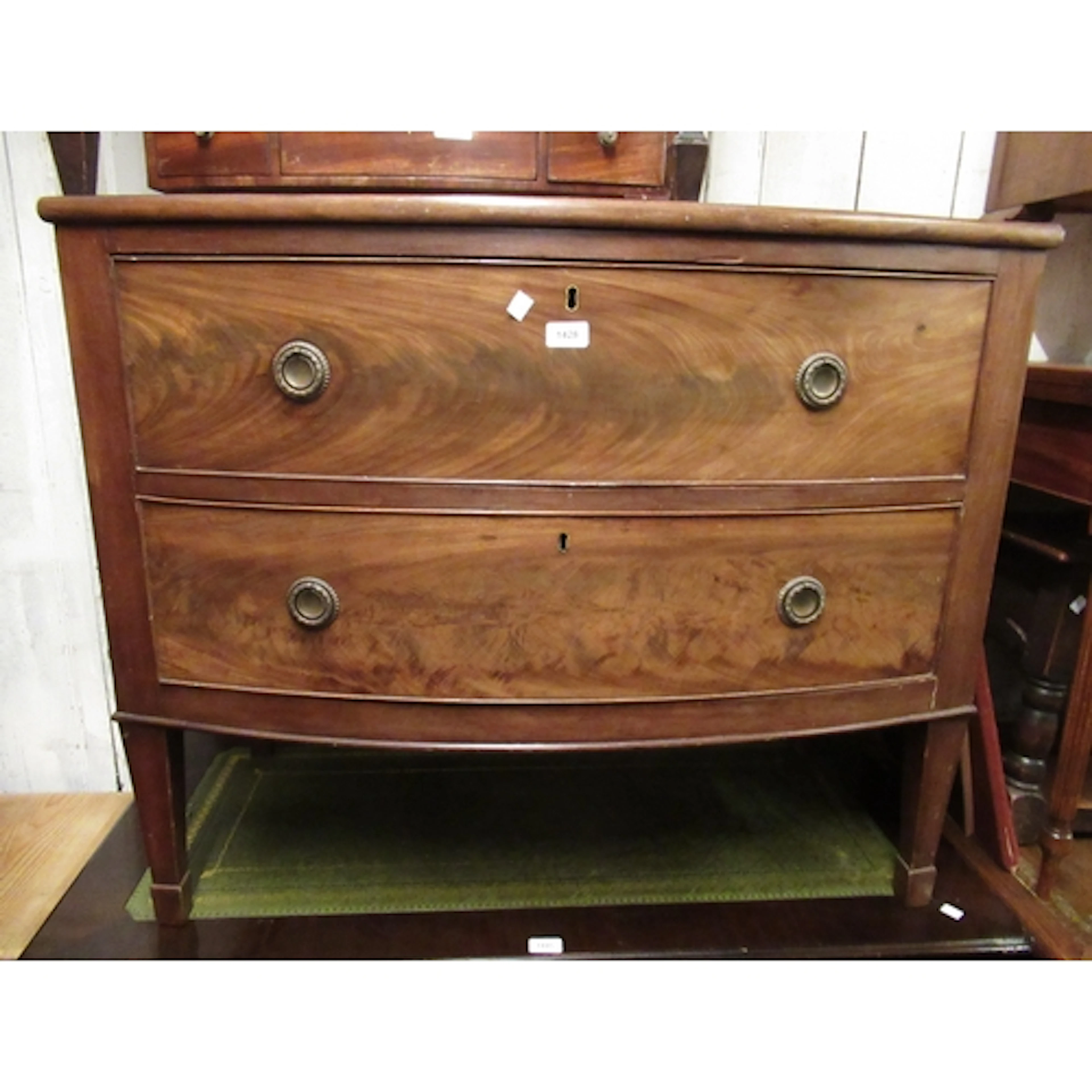 19th Century mahogany bow fronted chest, on stand, of two lo...